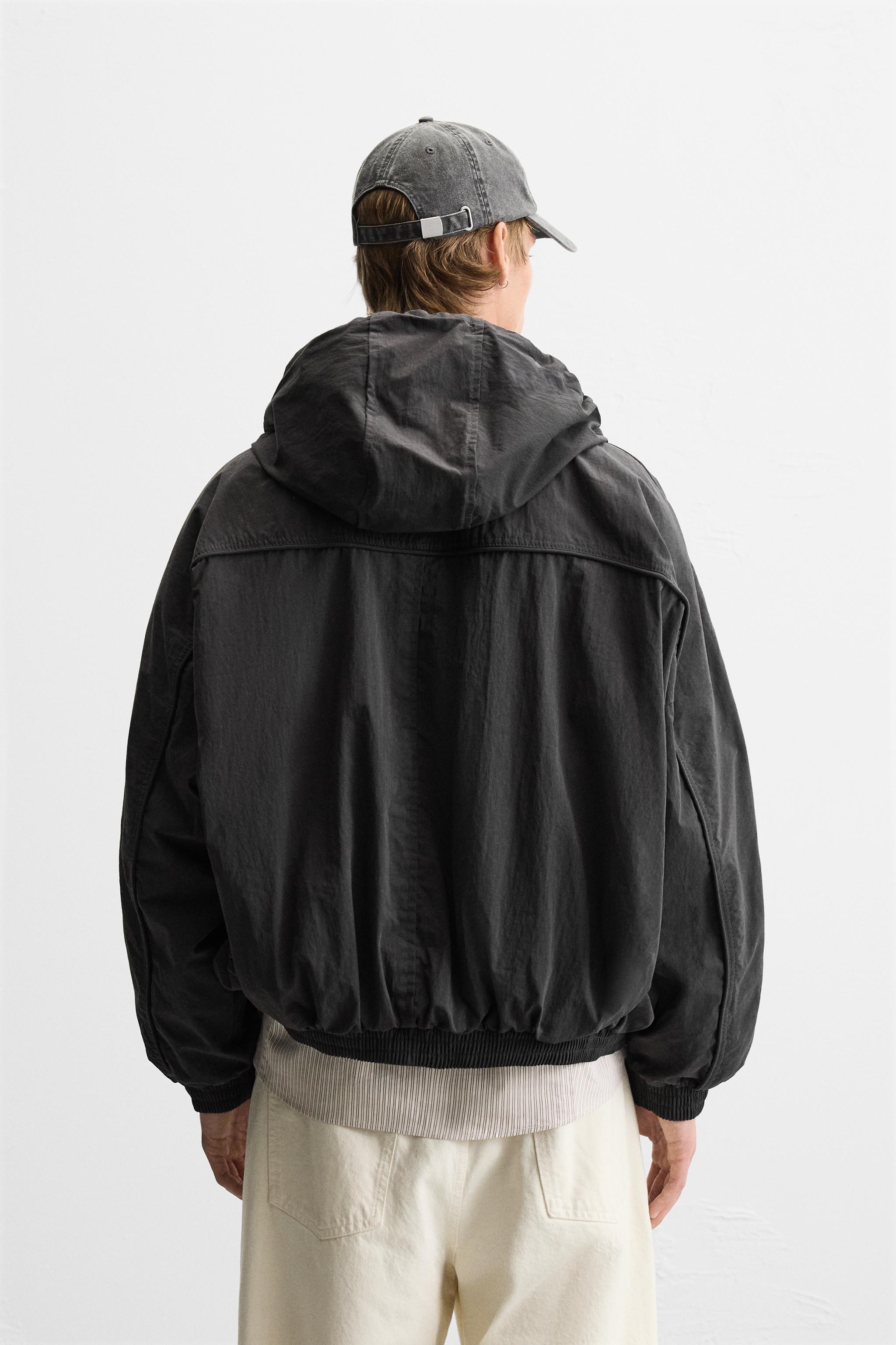 HOODED TECHNICAL JACKET Product Image