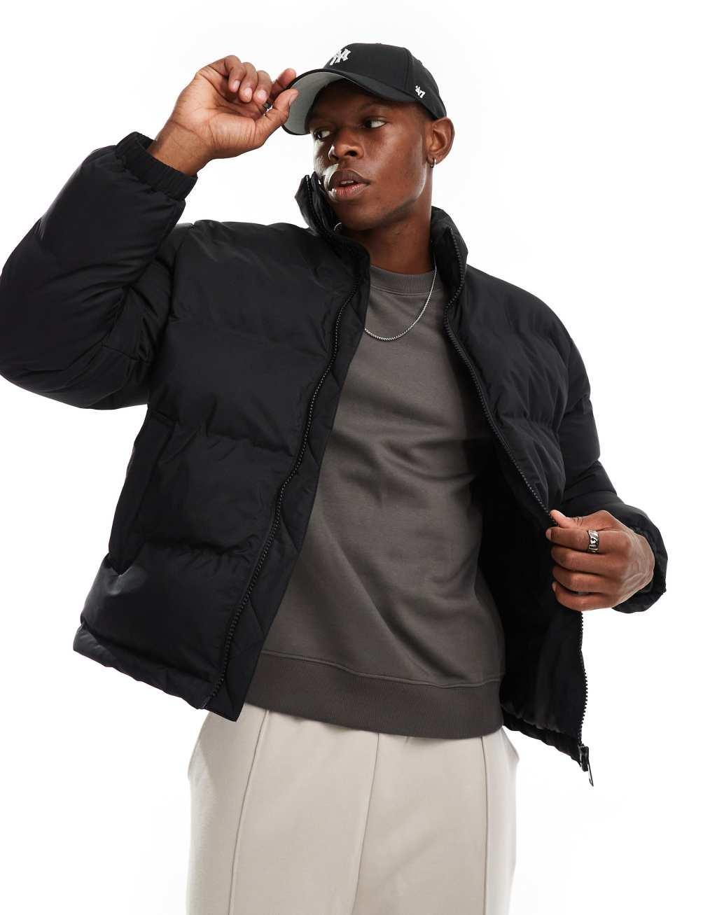 Weekday Cole puffer jacket in black Product Image