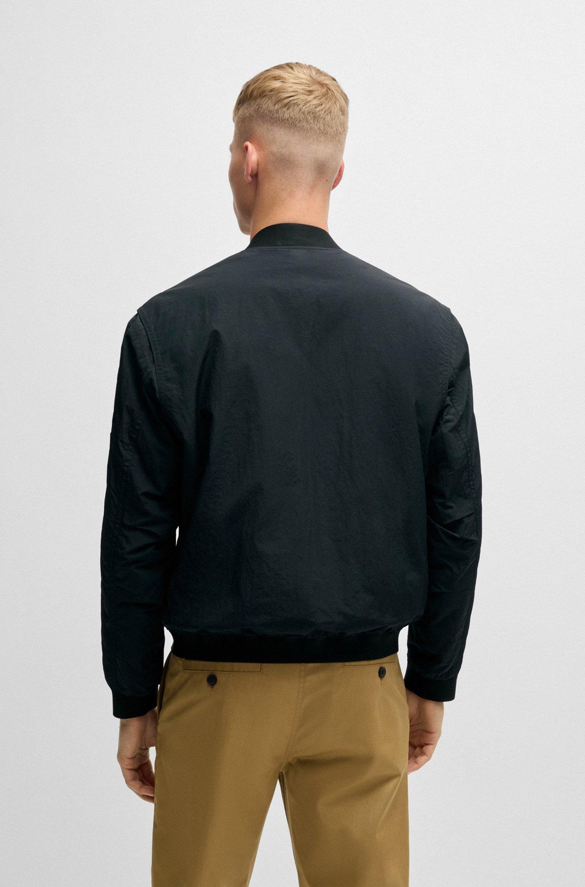 Water-repellent bomber jacket with logo badge Product Image