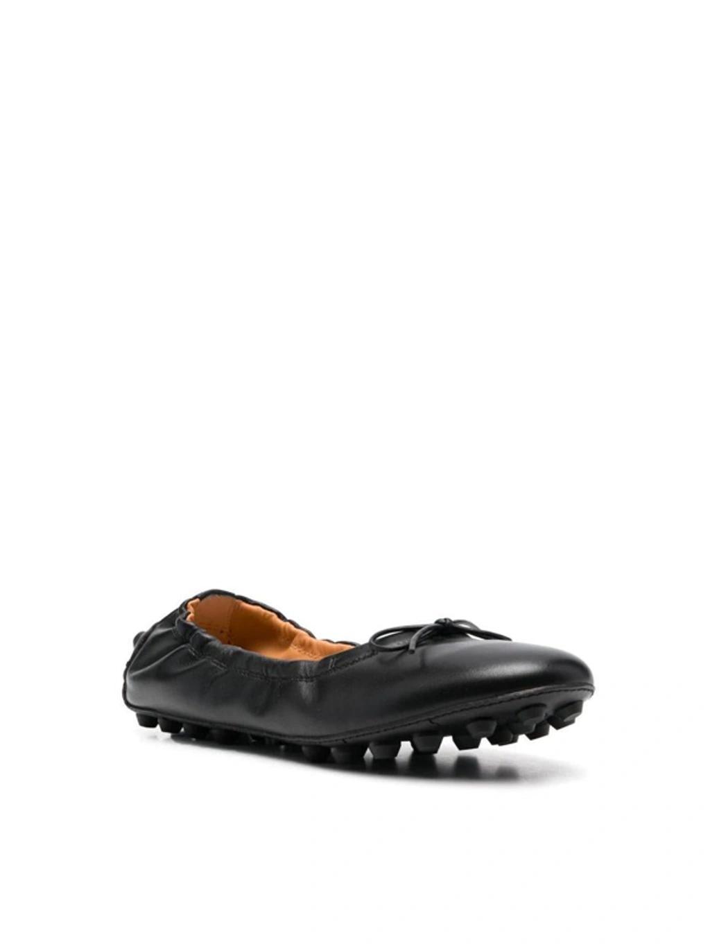 TOD'S Women's Ballerina With Bow And Grommets In Black Product Image