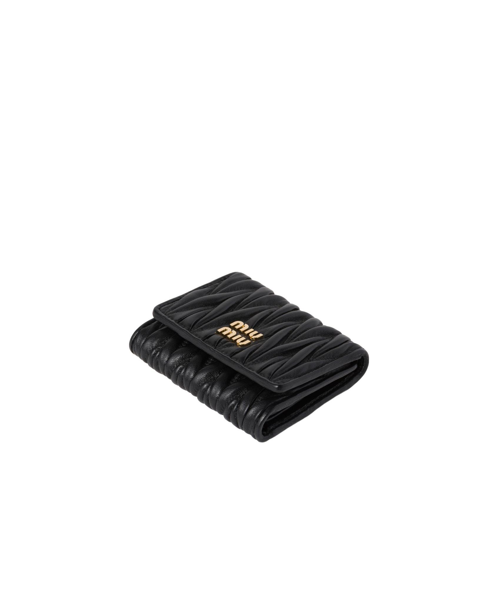 MIU MIU Logo-lettering Matelassé Wallet In Black Product Image