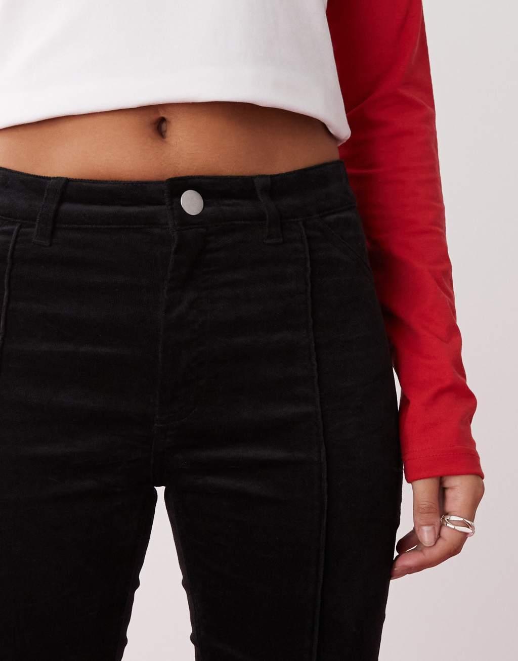 Monki cord flare leg pants with front pintuck seam in black Product Image