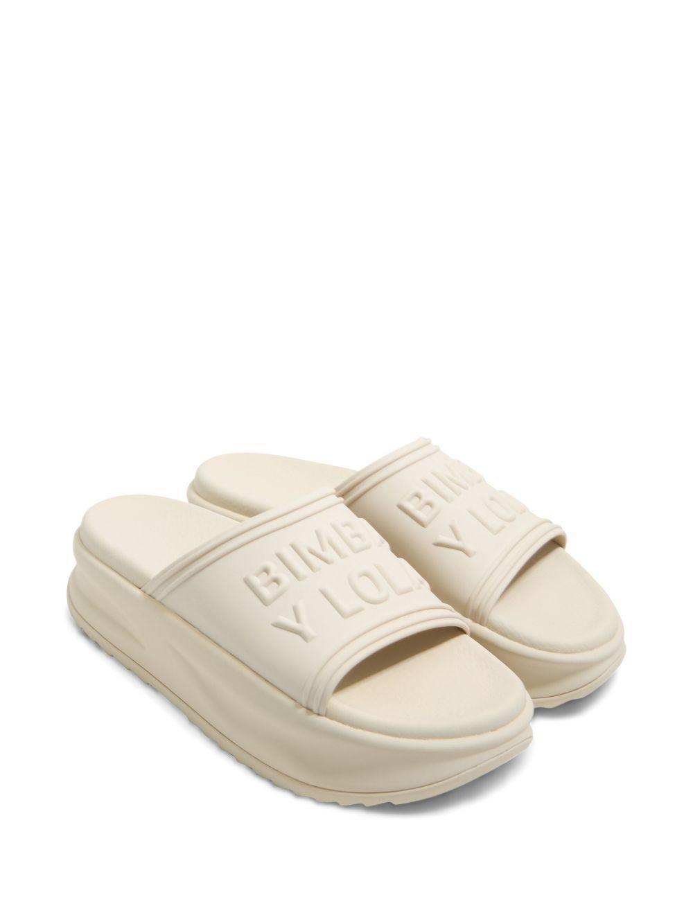 logo-embossed slides Product Image