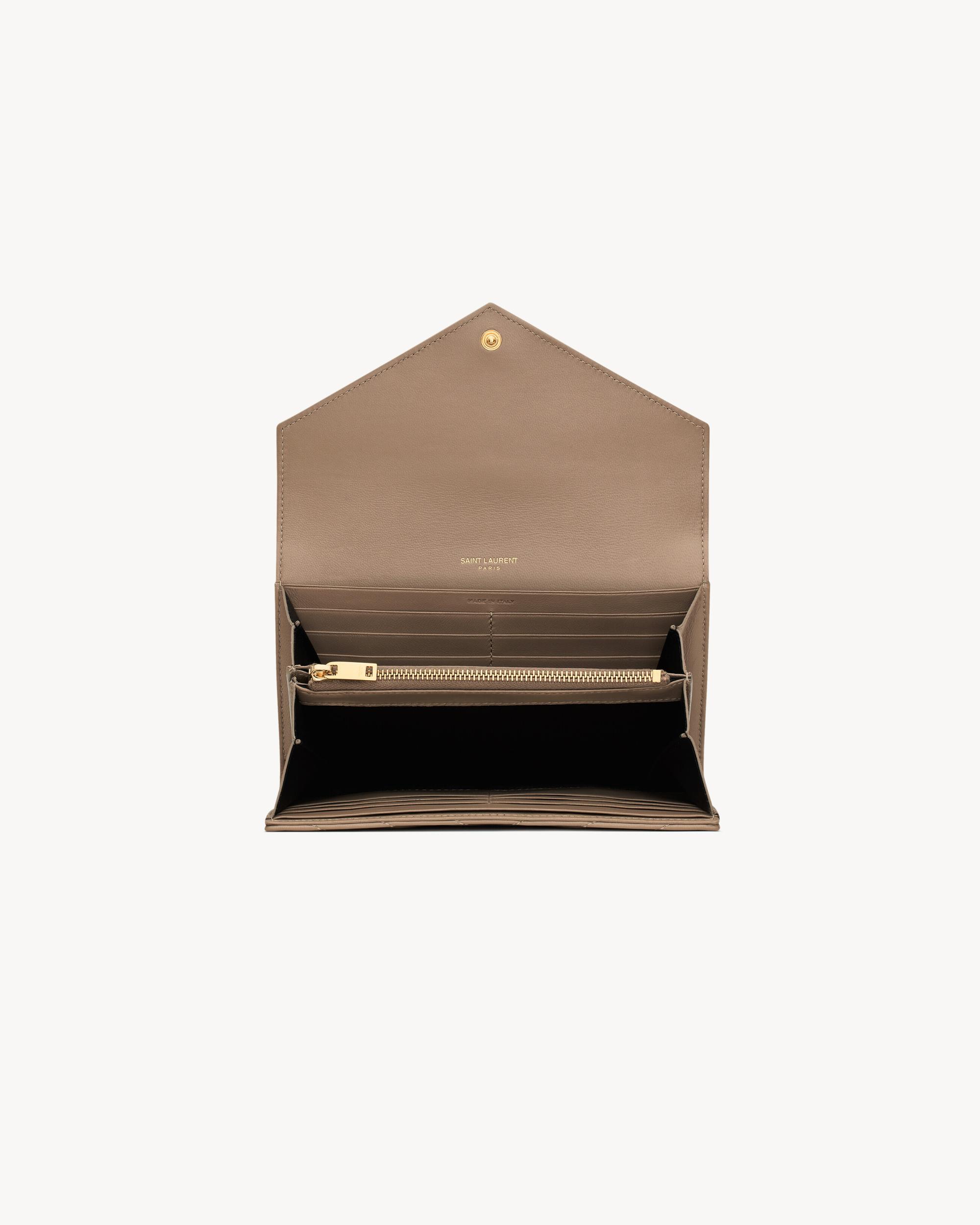 CASSANDRE MATELASSÉ large flap wallet in lambskin Product Image