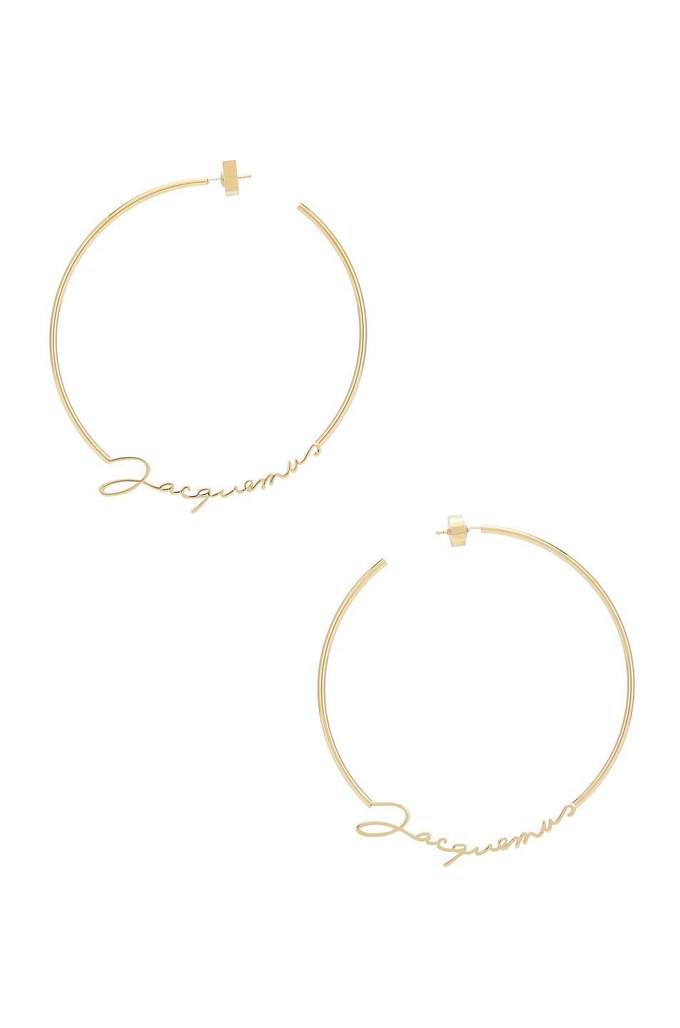 JACQUEMUS Les Creoles Jacquemus Earrings in Metallic Product Image