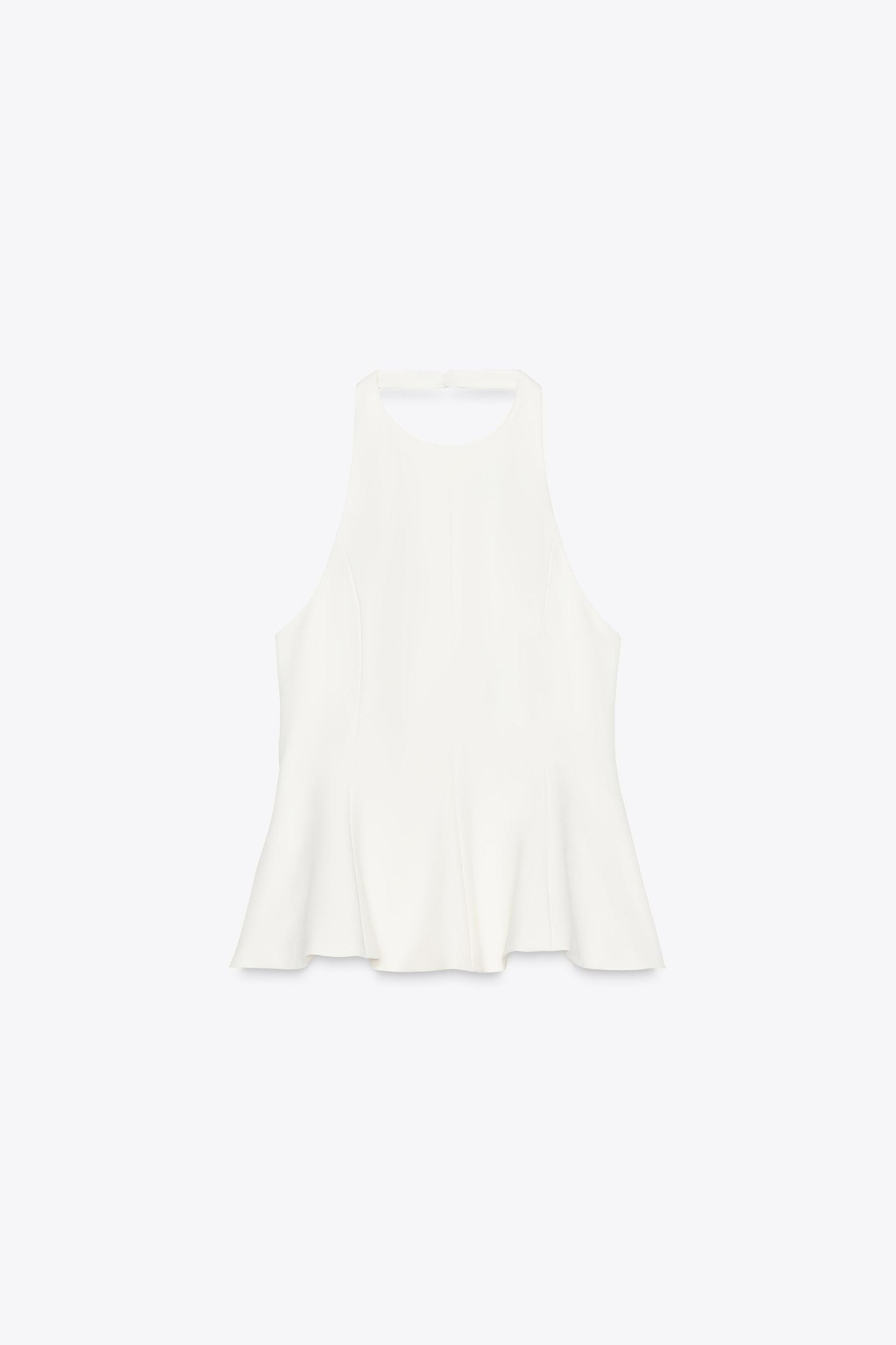 STRETCH PEPLUM TOP Product Image