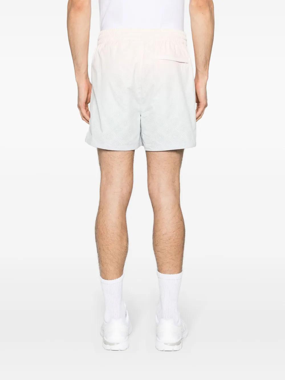 perforated-monogram gradient shorts Product Image