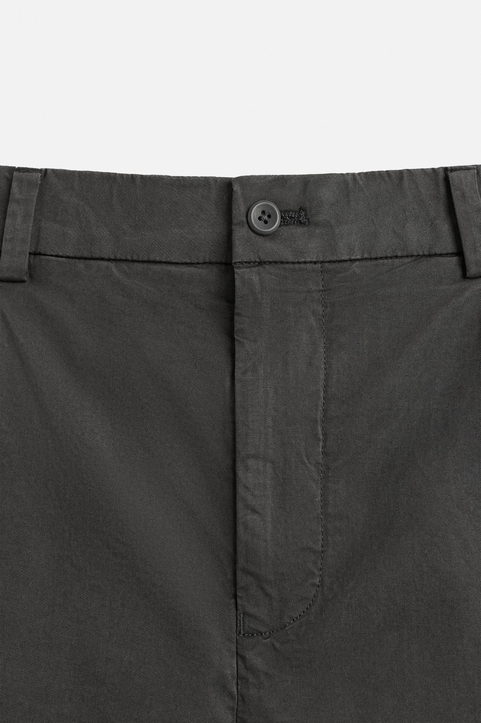 REGULAR FIT PLEATED BERMUDA SHORTS Product Image