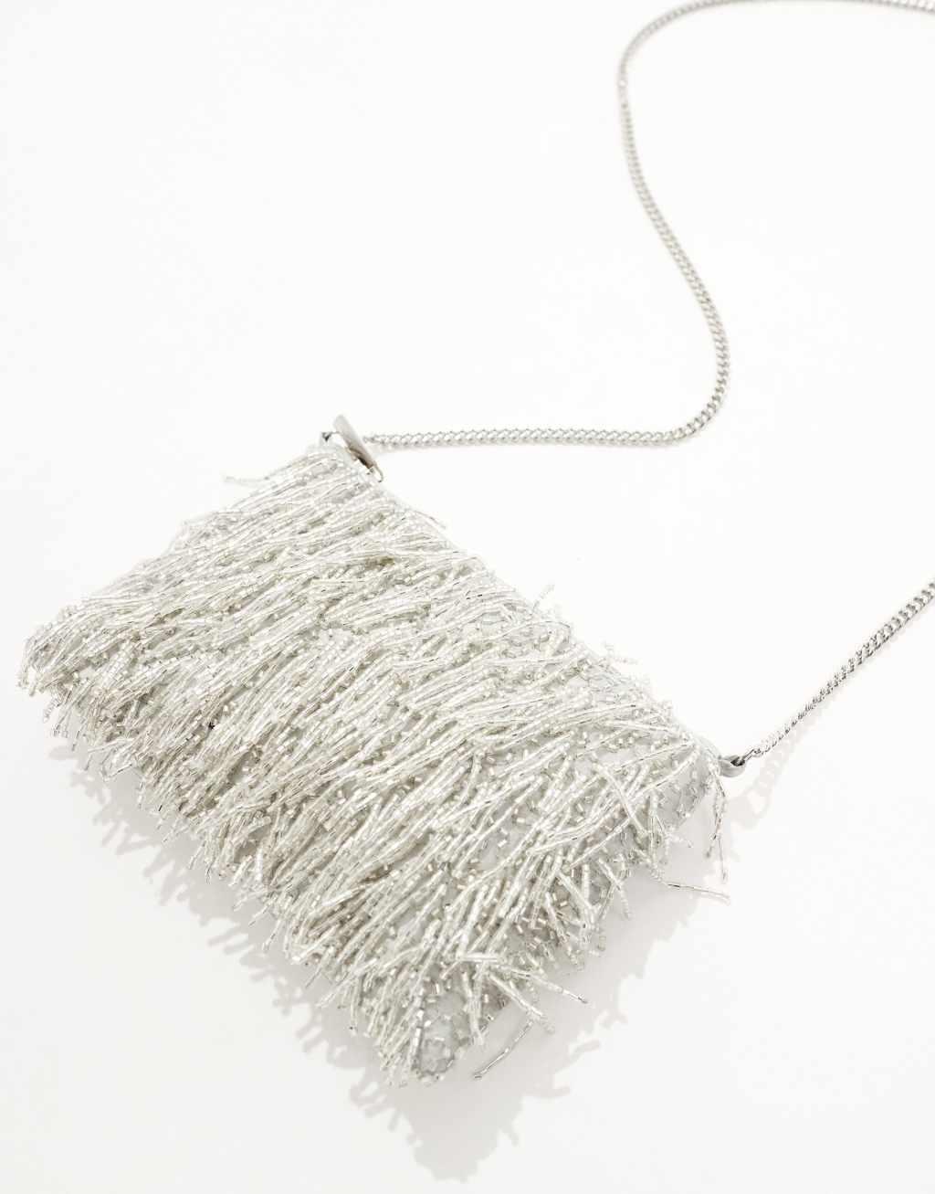 True Decadence embellished tassel clutch bag in silver Product Image