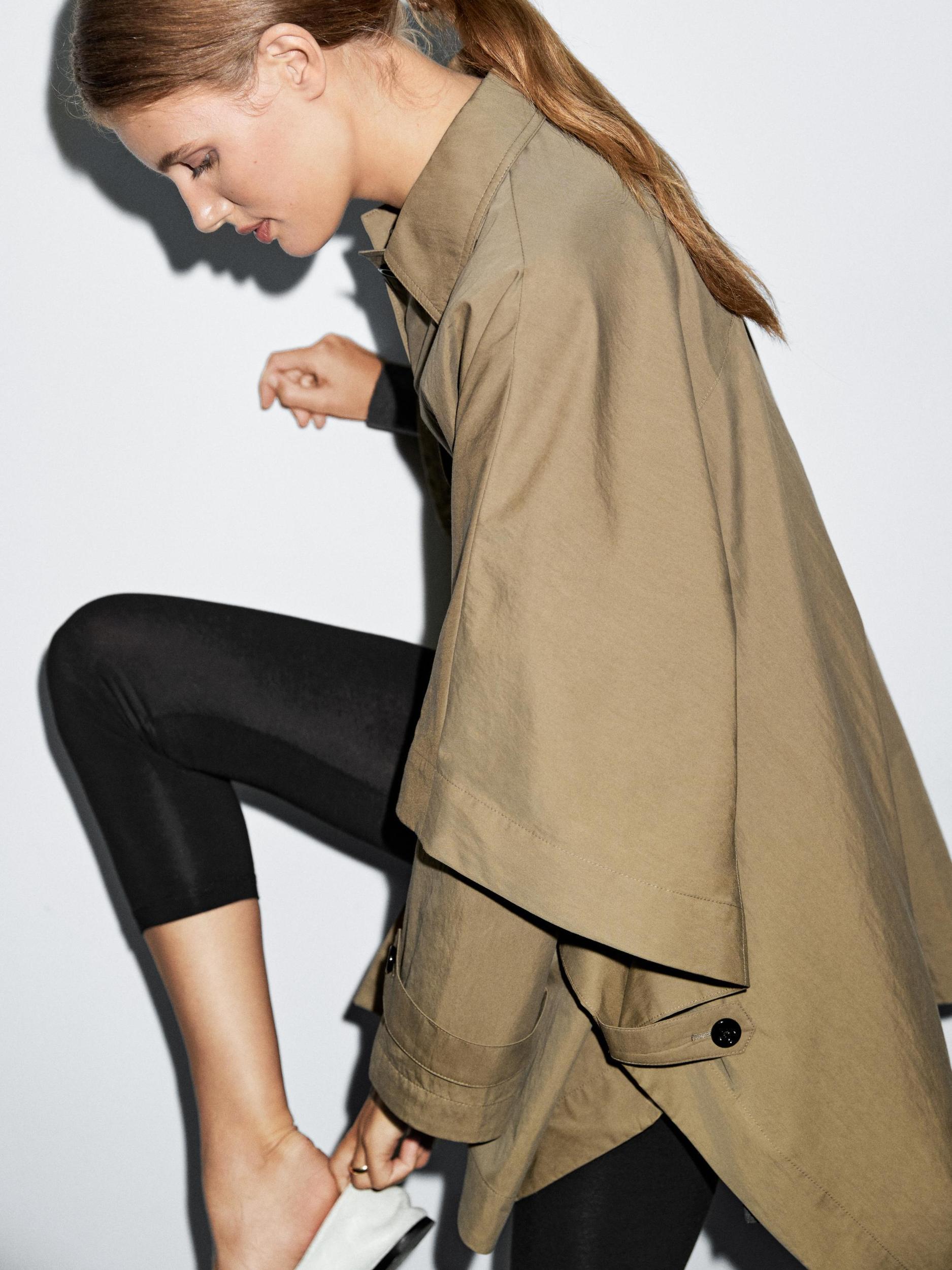 Cape trench coat with long sleeves Product Image