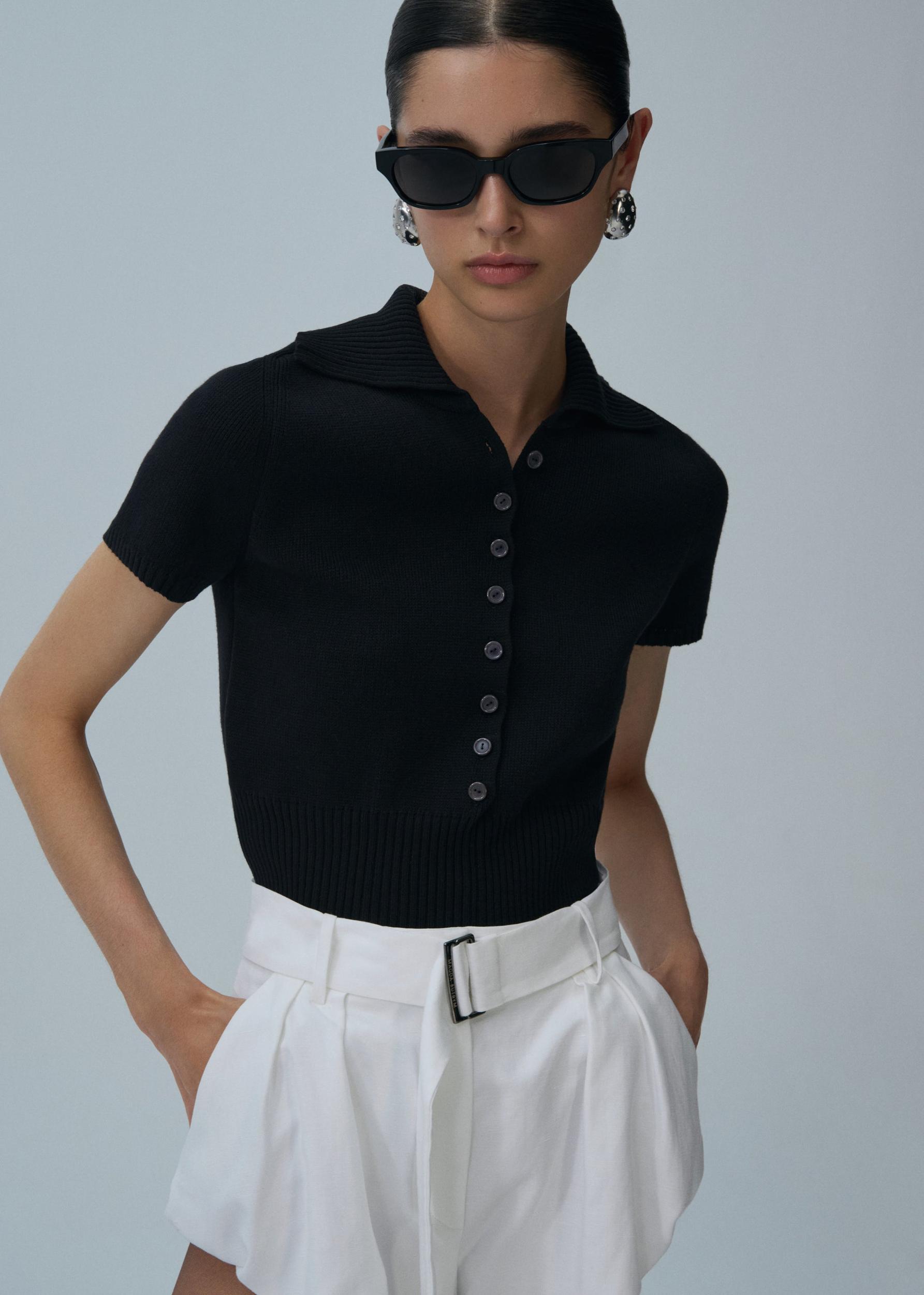 Short-sleeve buttoned cropped sweater in black Product Image