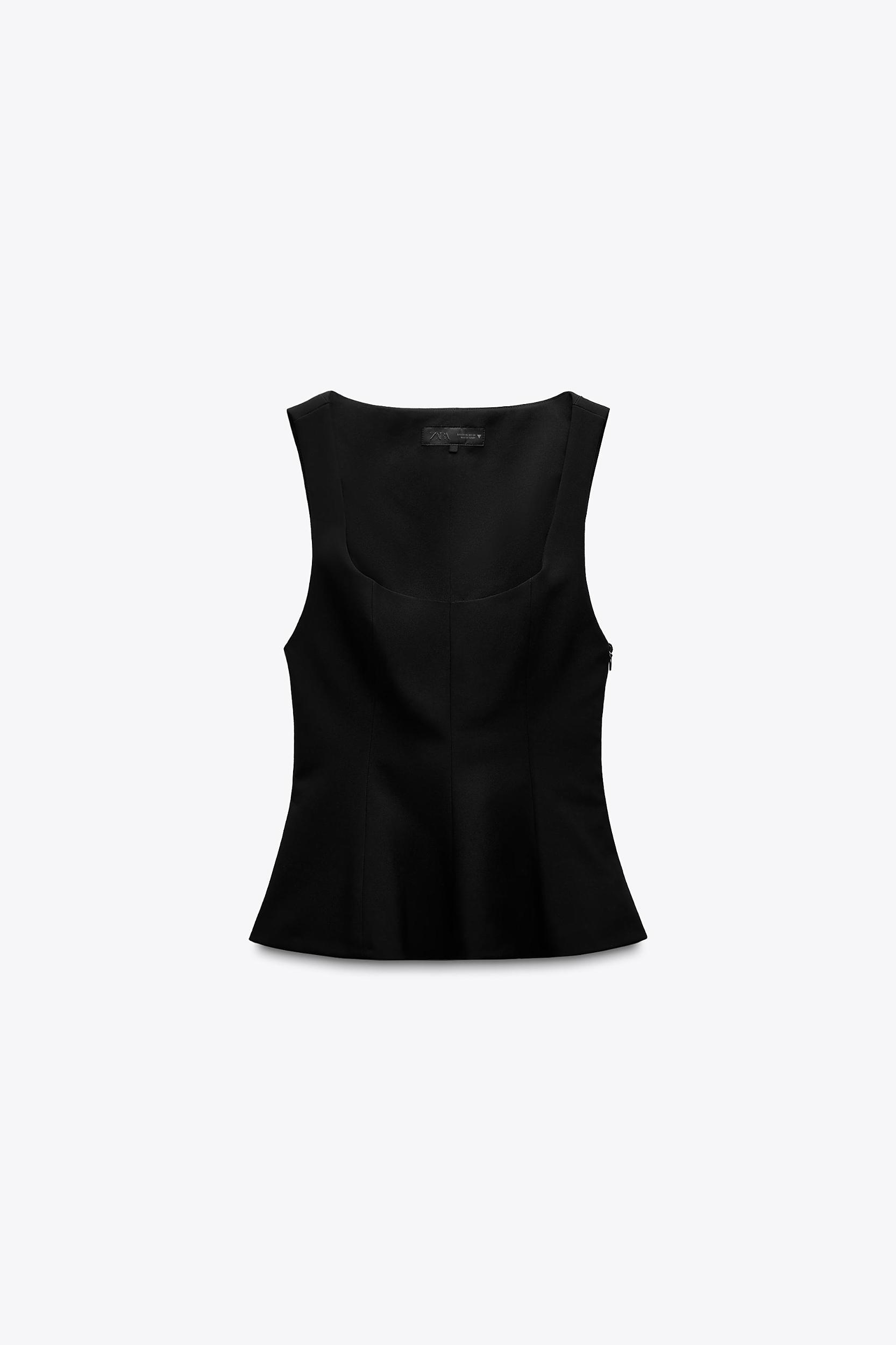 STRETCHY PEPLUM TOP Product Image