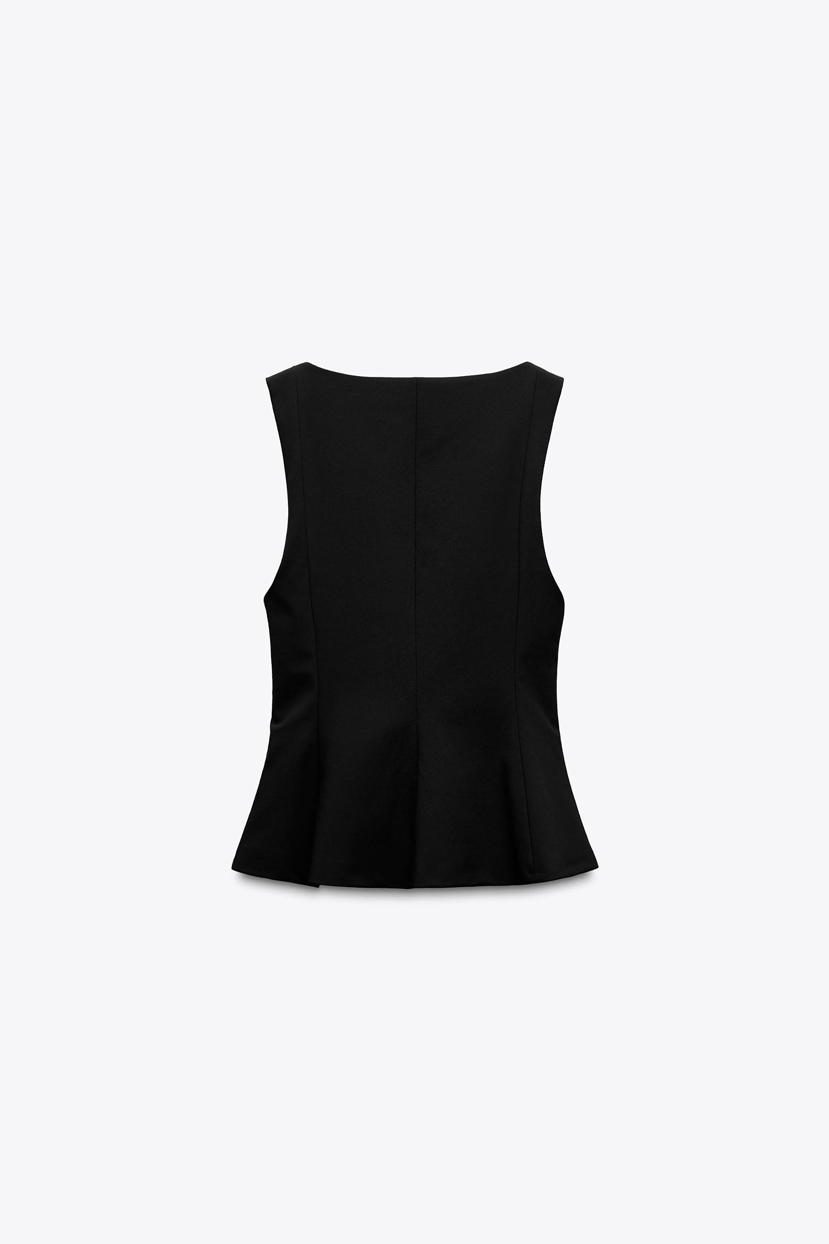 STRETCHY PEPLUM TOP Product Image