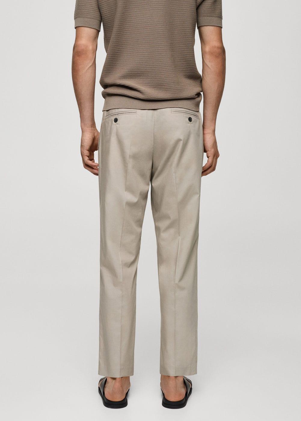 Slim-fit lyocell pleated trousers - Men | MANGO USA Product Image