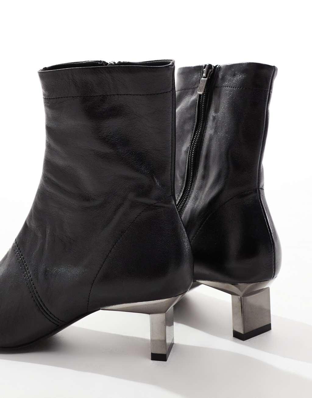 ASOS DESIGN Rise premium leather boots with metal heel detail in black Product Image