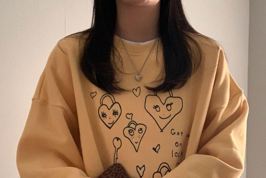 Heart Print Loose-Fit Sweatshirt Product Image