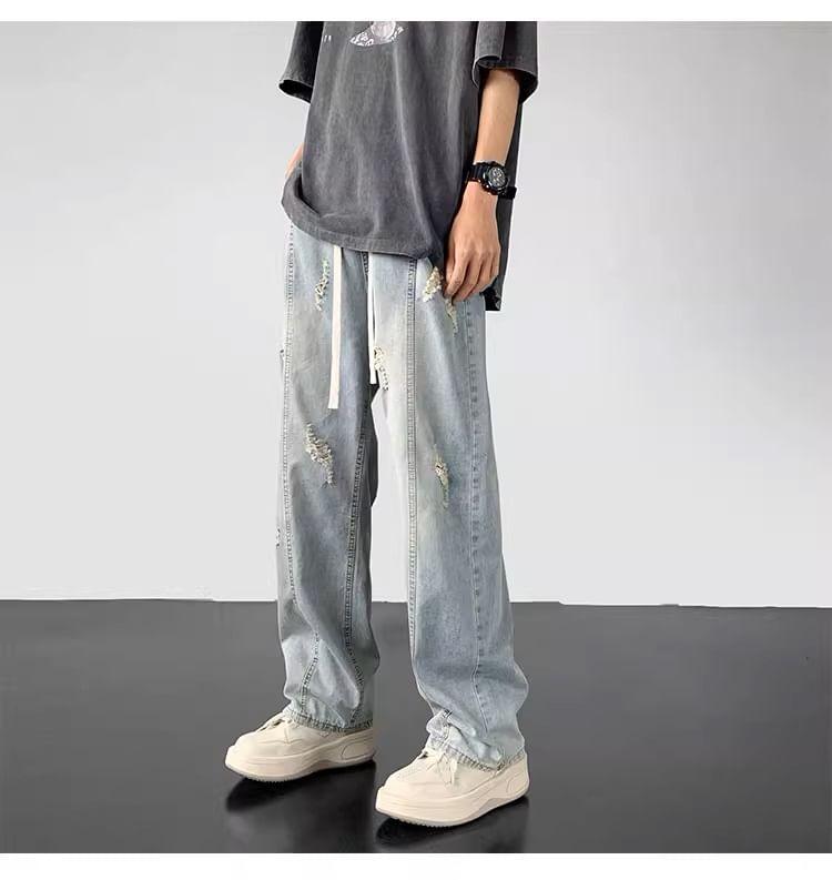 Drawstring Waist Washed Distressed Loose Fit Jeans Product Image