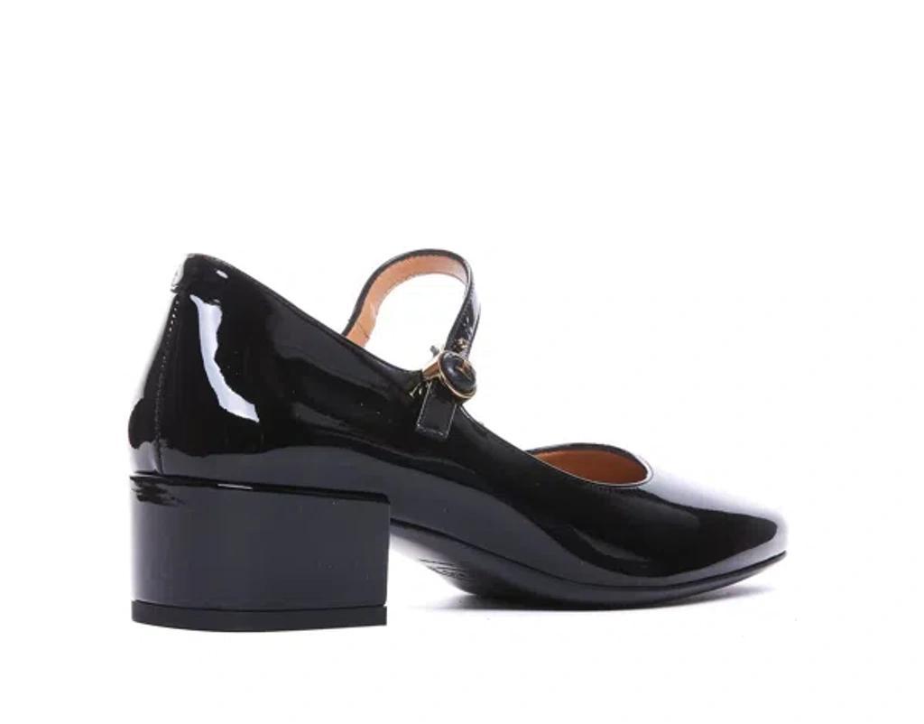 TOD'S Black Flats Product Image