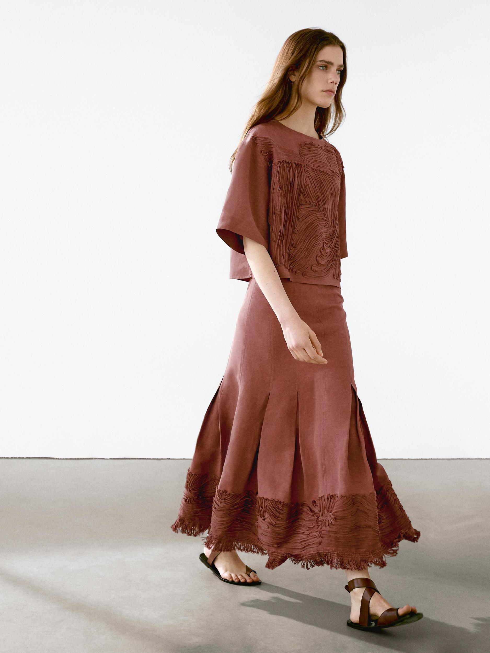 Flowing top with embroidered detail Product Image