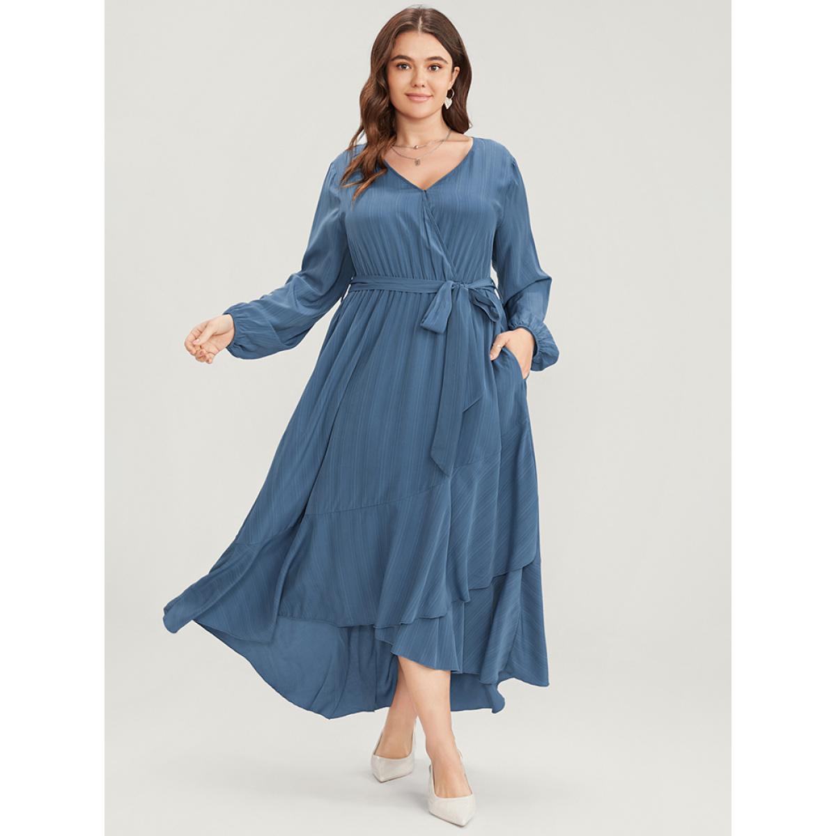 Plus Size Solid Surplice Neck Lantern Sleeve Pocket Belted Asymmetrical Hem Dress Cerulean Women Elegant Asymmetrical V-neck Long Sleeve Curvy Midi Dress BloomChic 30/6X Product Image