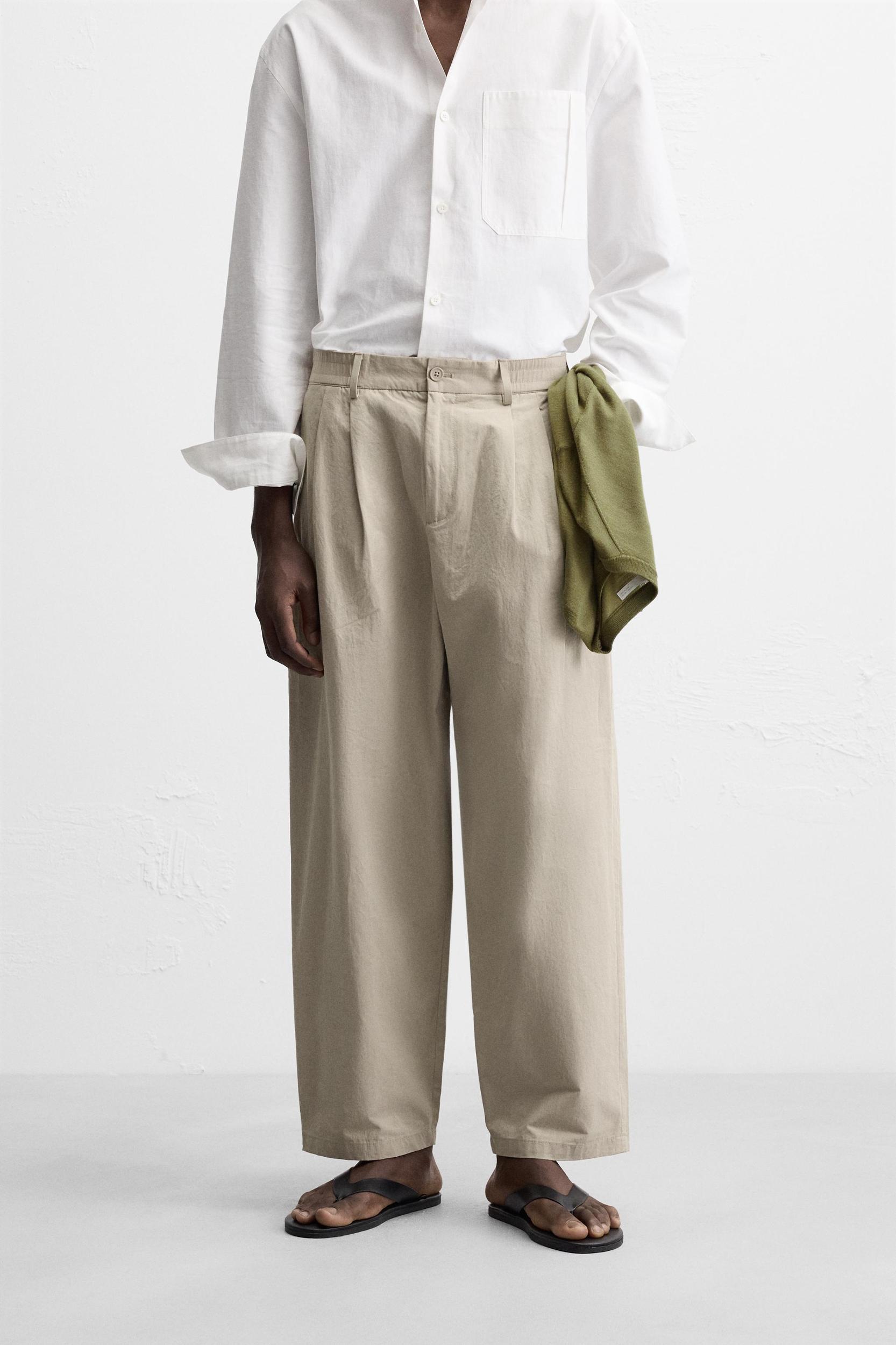 PLEATED CHINO PANTS Product Image
