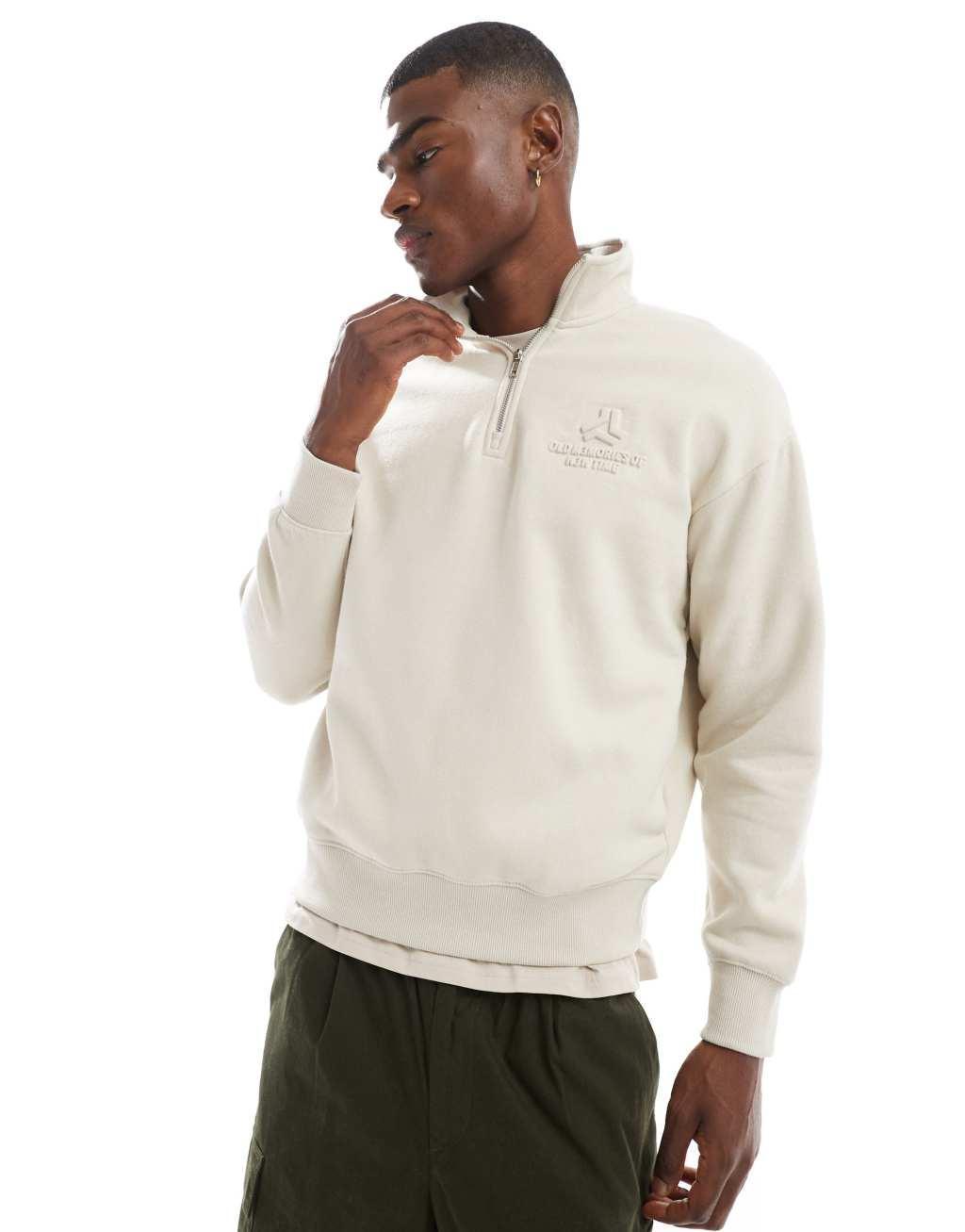 Bershka 1/4 zip sweatshirt with emboss print in ecru Product Image