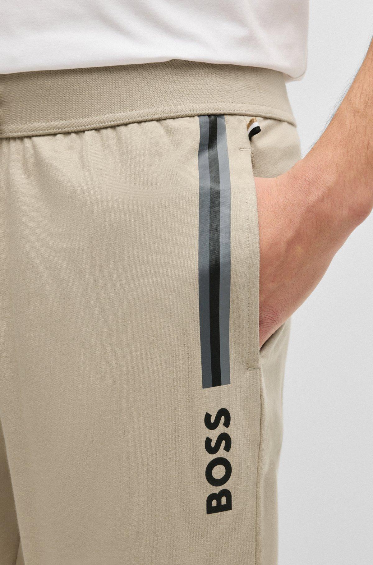 Drawcord tracksuit bottoms in cotton terry with logo print Product Image