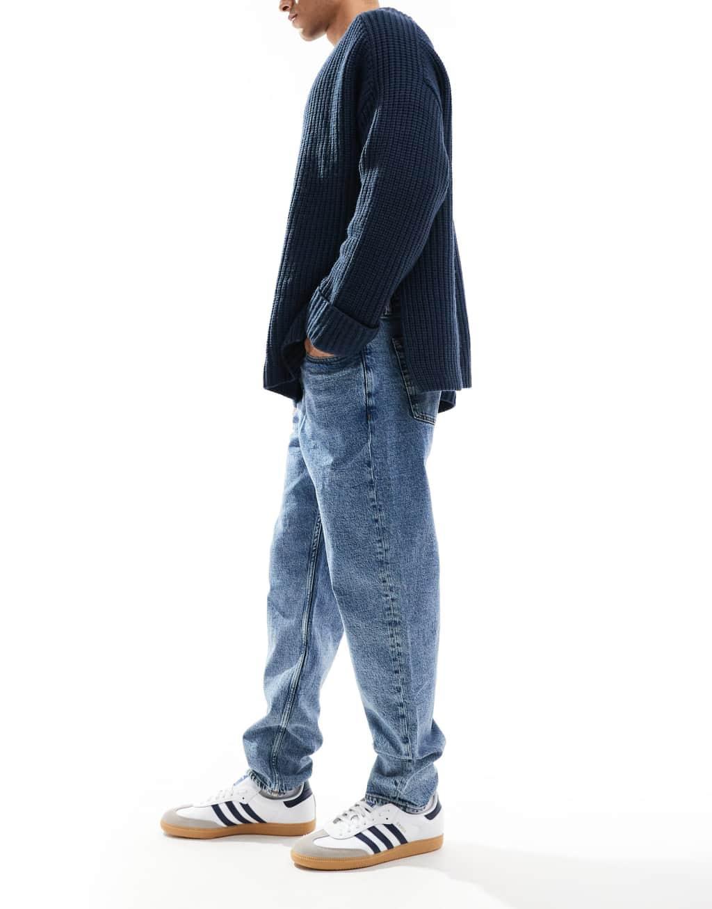 Tommy Jeans Isaac relaxed tapered jeans in mid wash Product Image