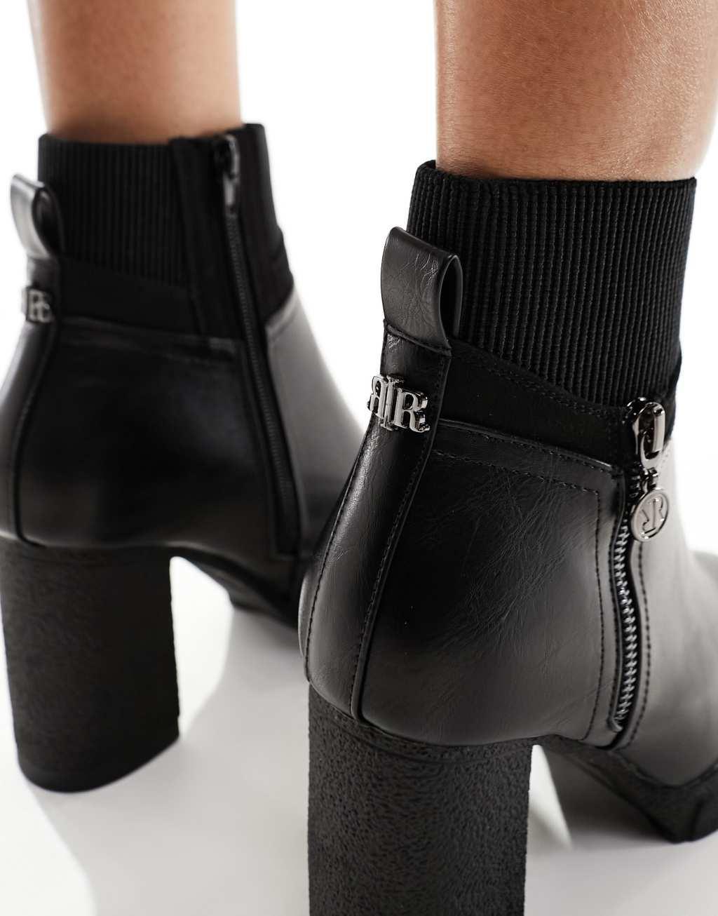 River Island heeled boot with side zip in black Product Image