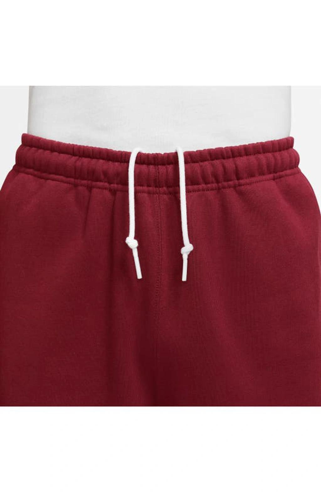 Men's Solo Swoosh Fleece Pants In Red Product Image