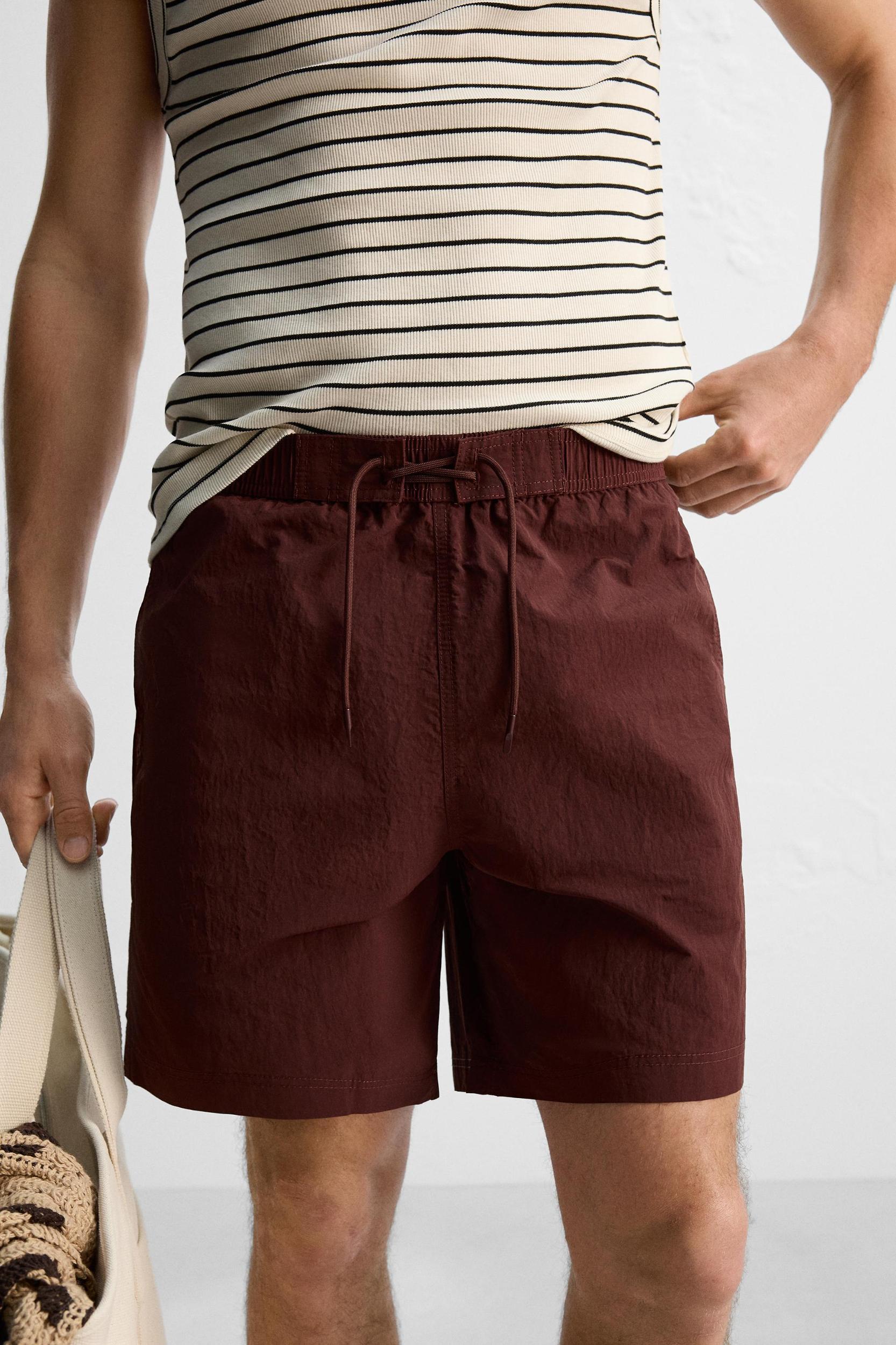 DRAWSTRING SWIM TRUNKS Product Image