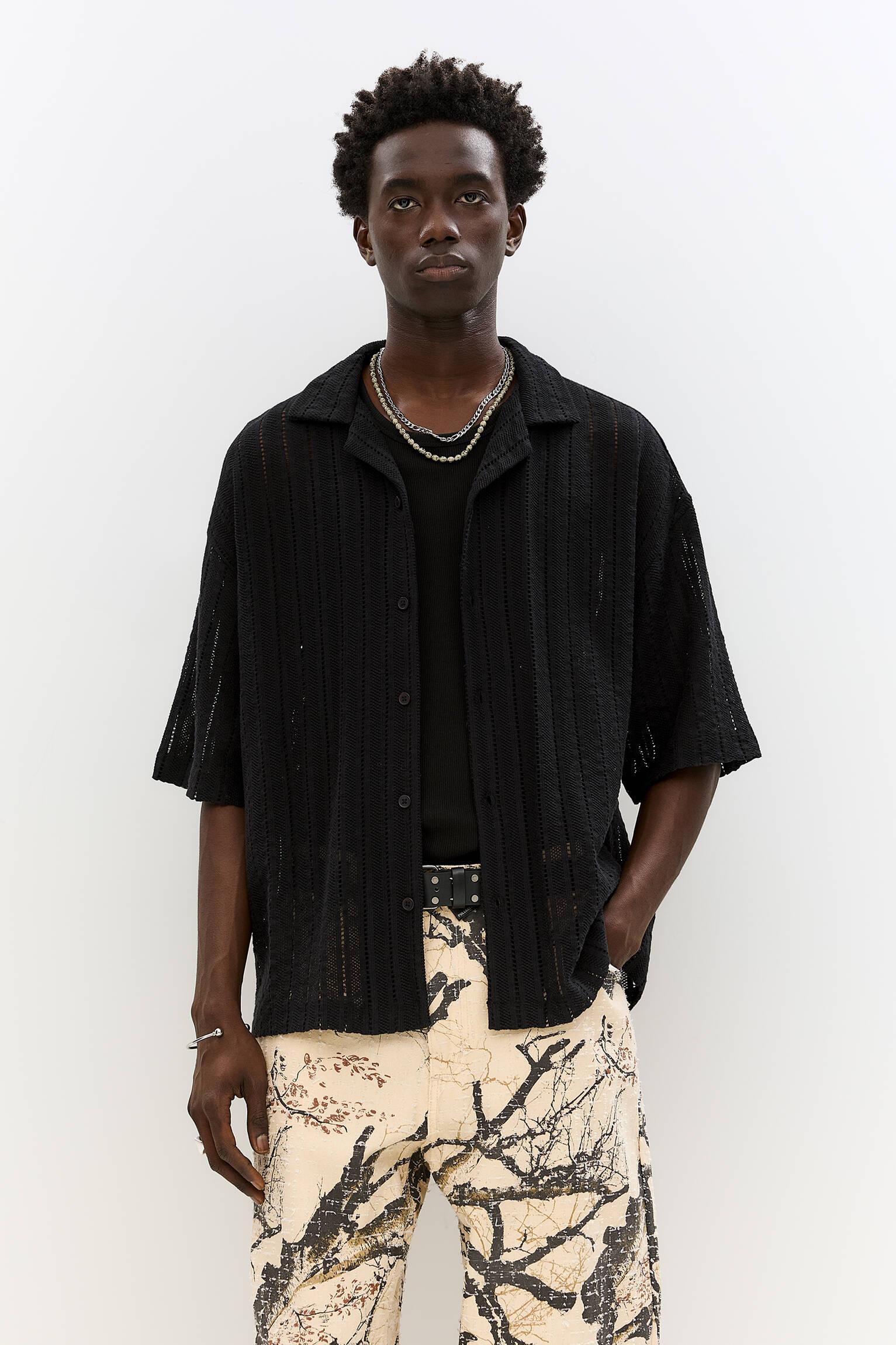 Black textured short sleeve shirt Product Image