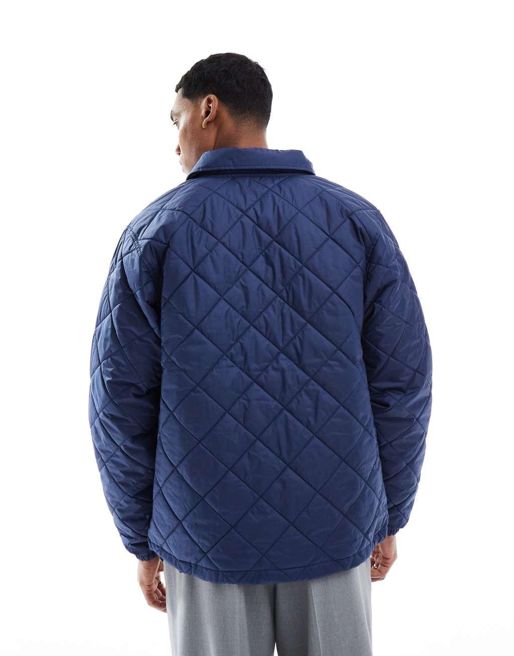 Nike Club quilted jacket in navy Product Image