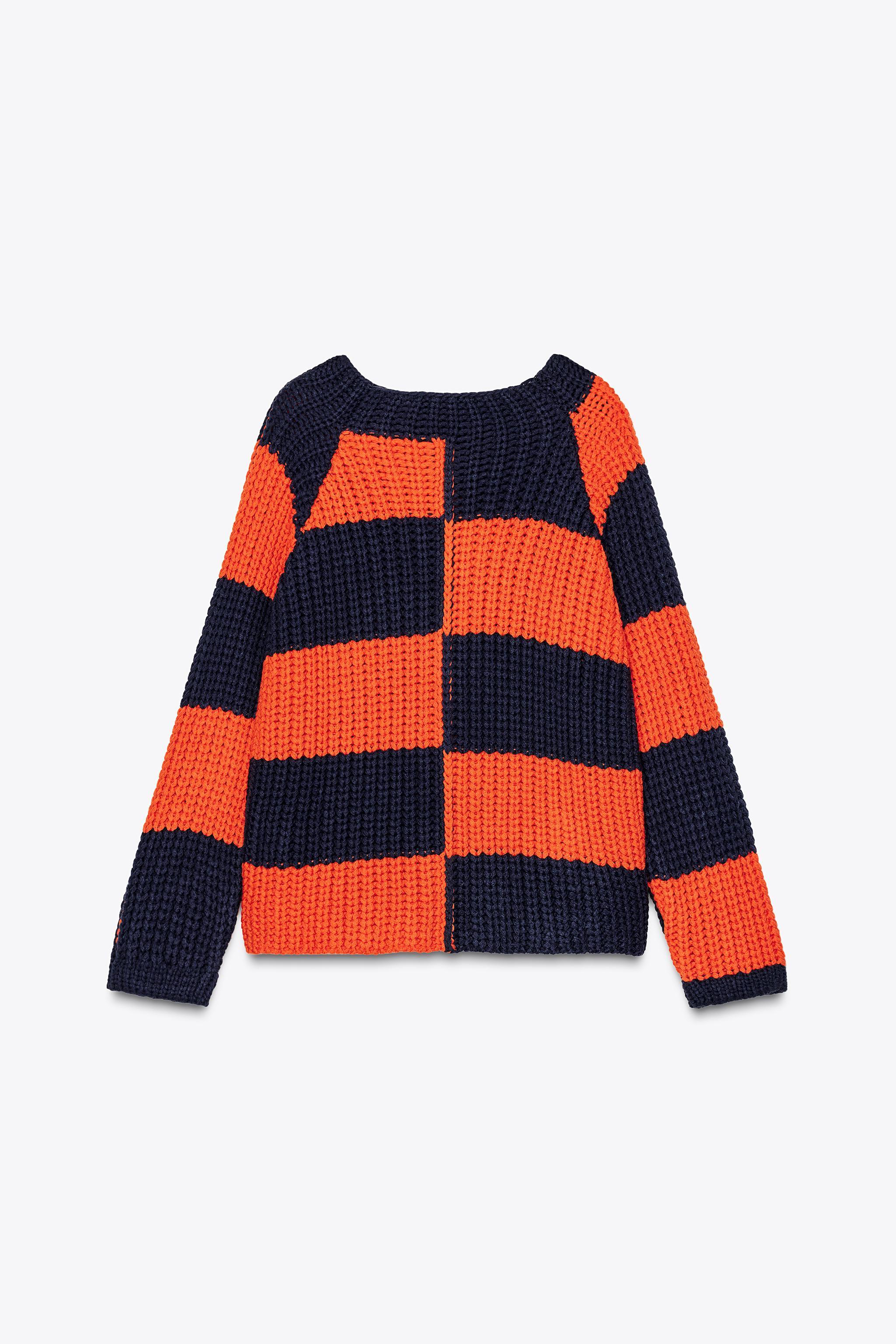 STRIPED OVERSIZE KNIT SWEATER Product Image