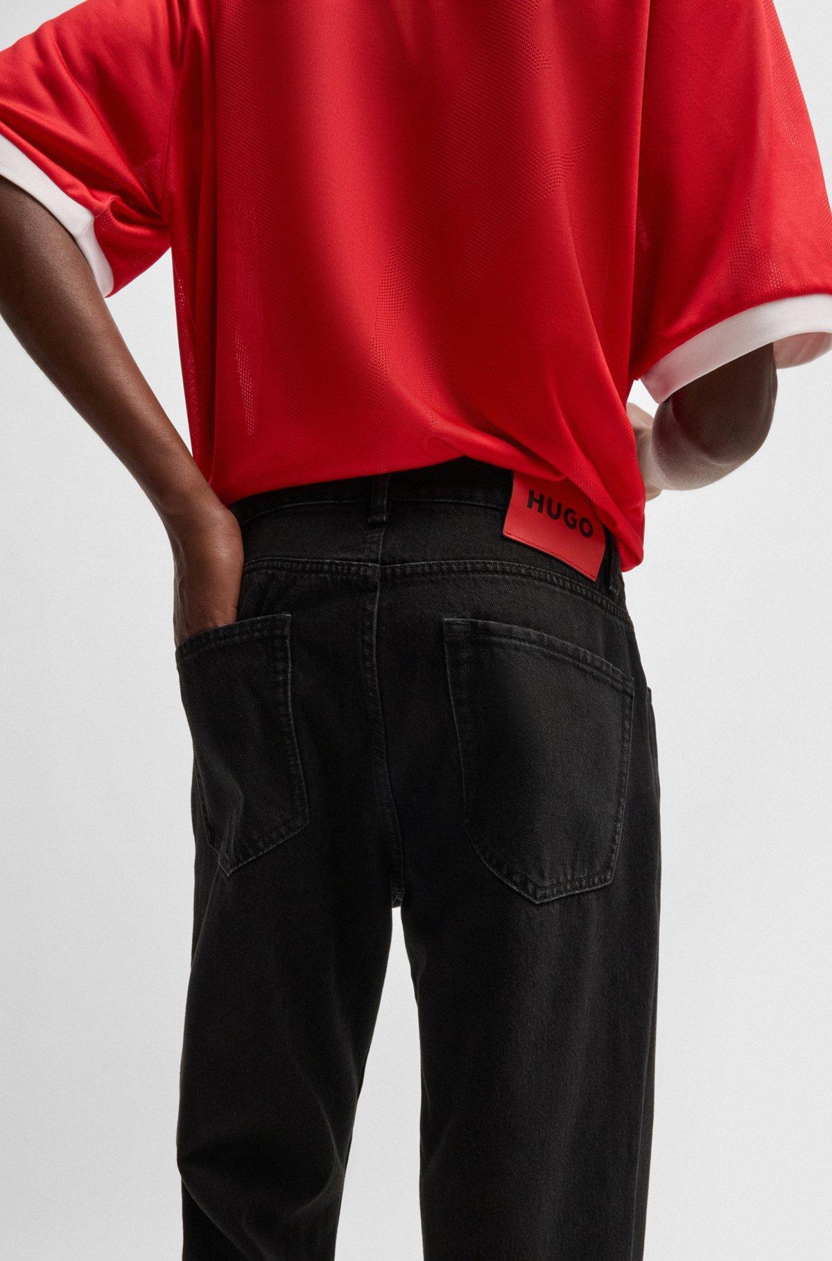 Relaxed tapered-fit jeans in black denim Product Image