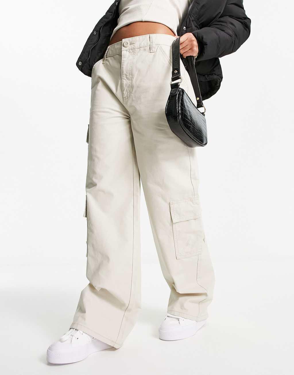 ASOS DESIGN oversized cargo pants with multi pocket in stone Product Image