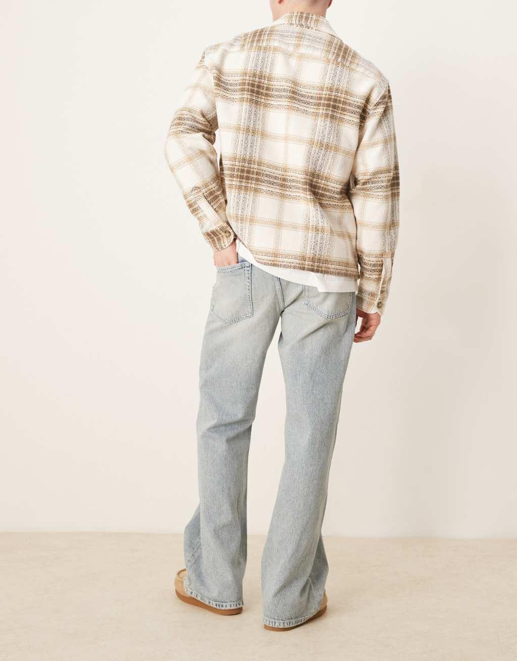 ASOS DESIGN wide flare jeans in bleached wash Product Image
