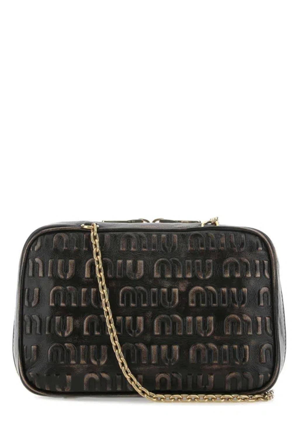 MIU MIU Logo Embossed Zipped Shoulder Bag In Dark Brown Product Image