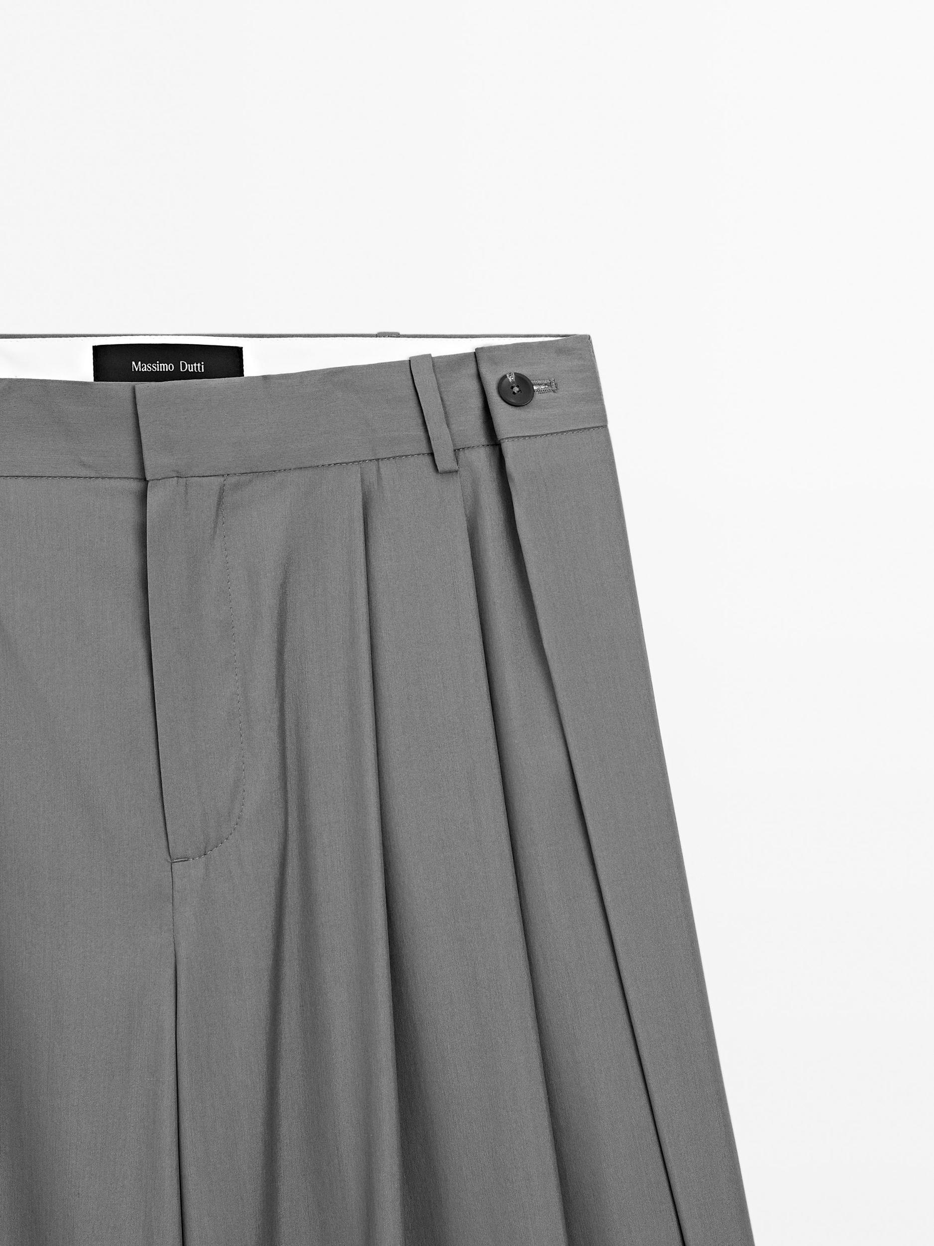 Flowing trousers with darts Product Image