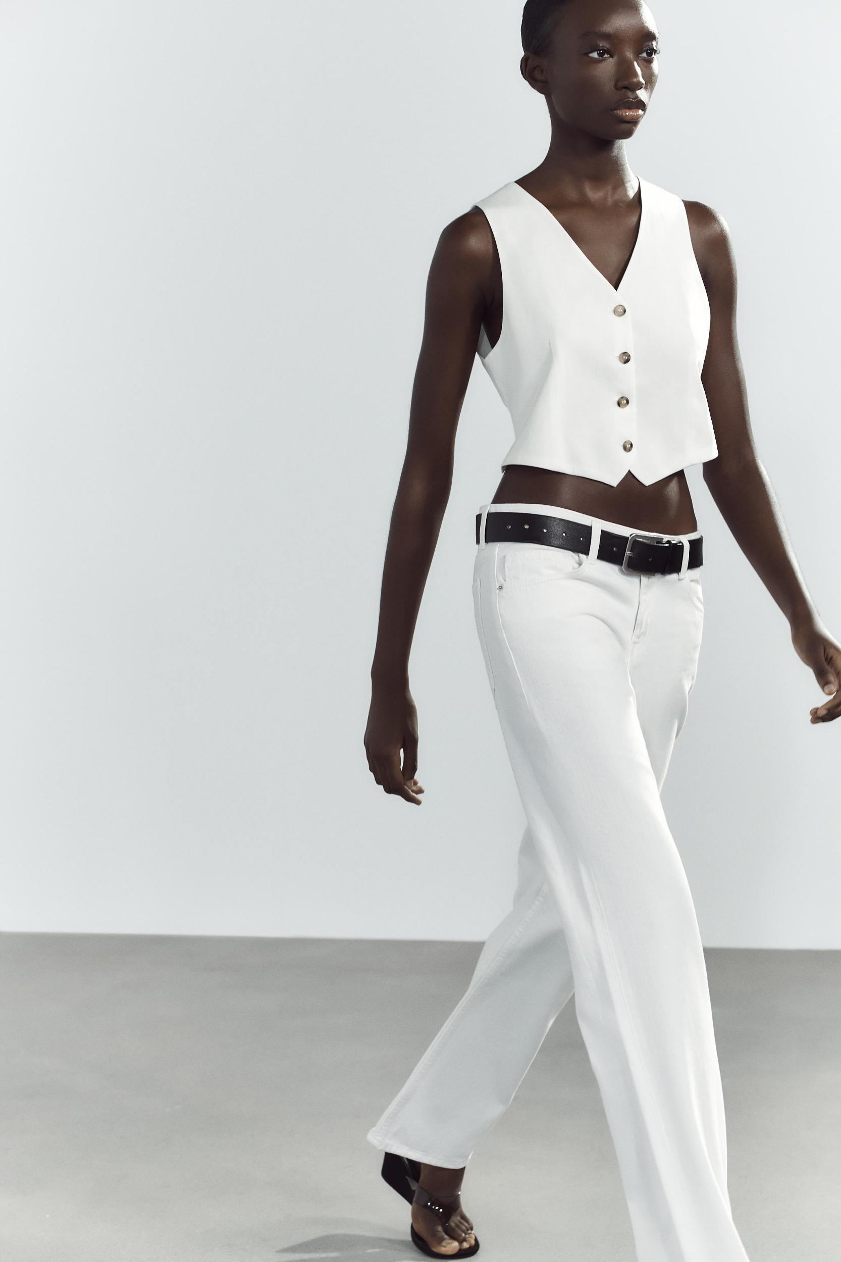 BACK CUT OUT VEST Product Image