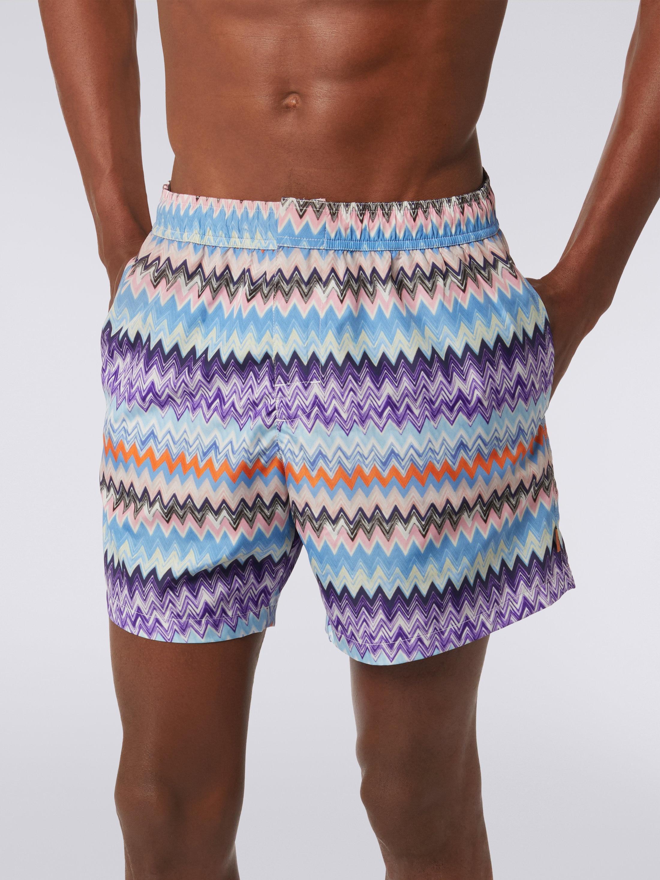 Technical fabric swimming trunks with chevron print Product Image