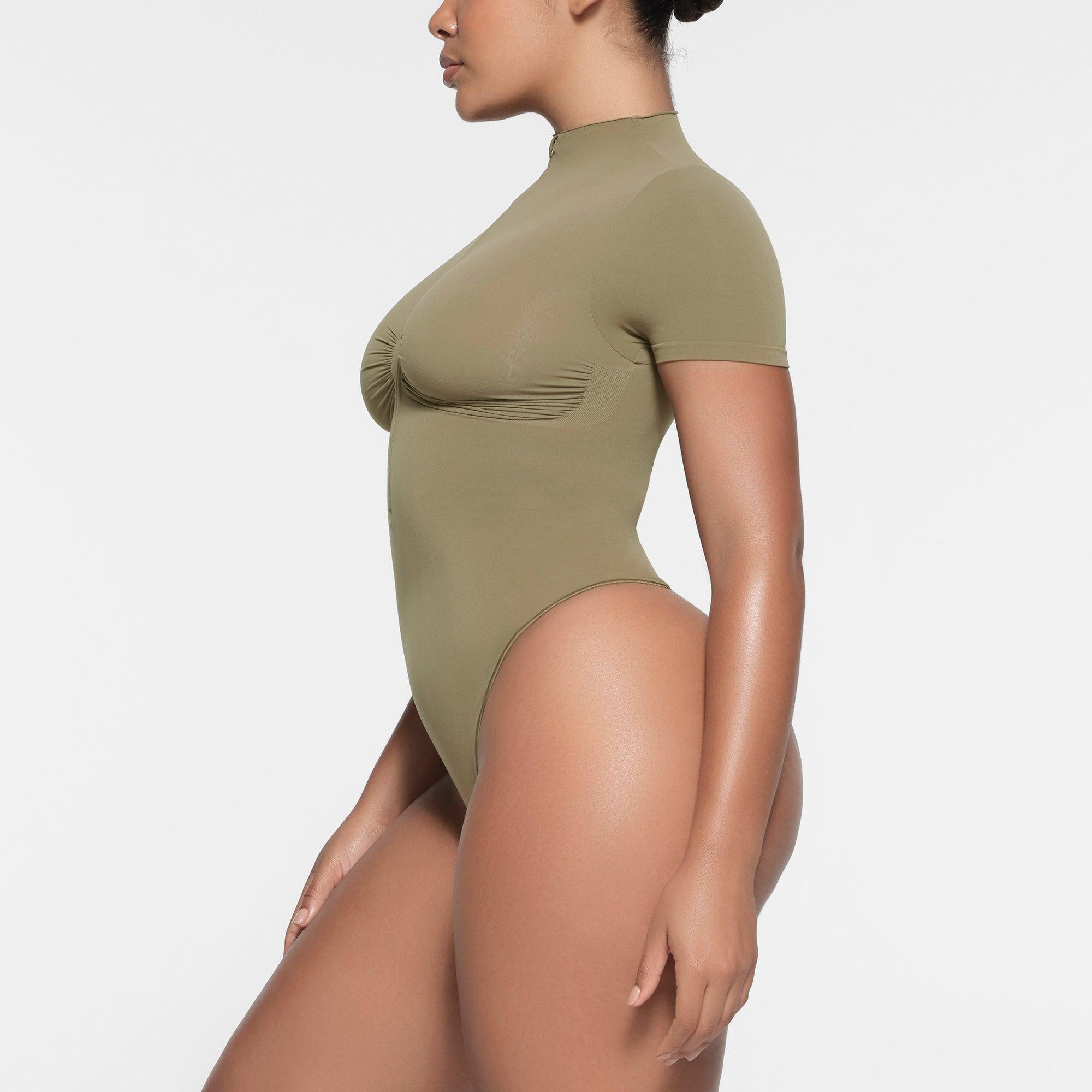 SEAMLESS SCULPT ZIP FRONT SLEEVELESS THONG BODYSUIT | ARMY Product Image