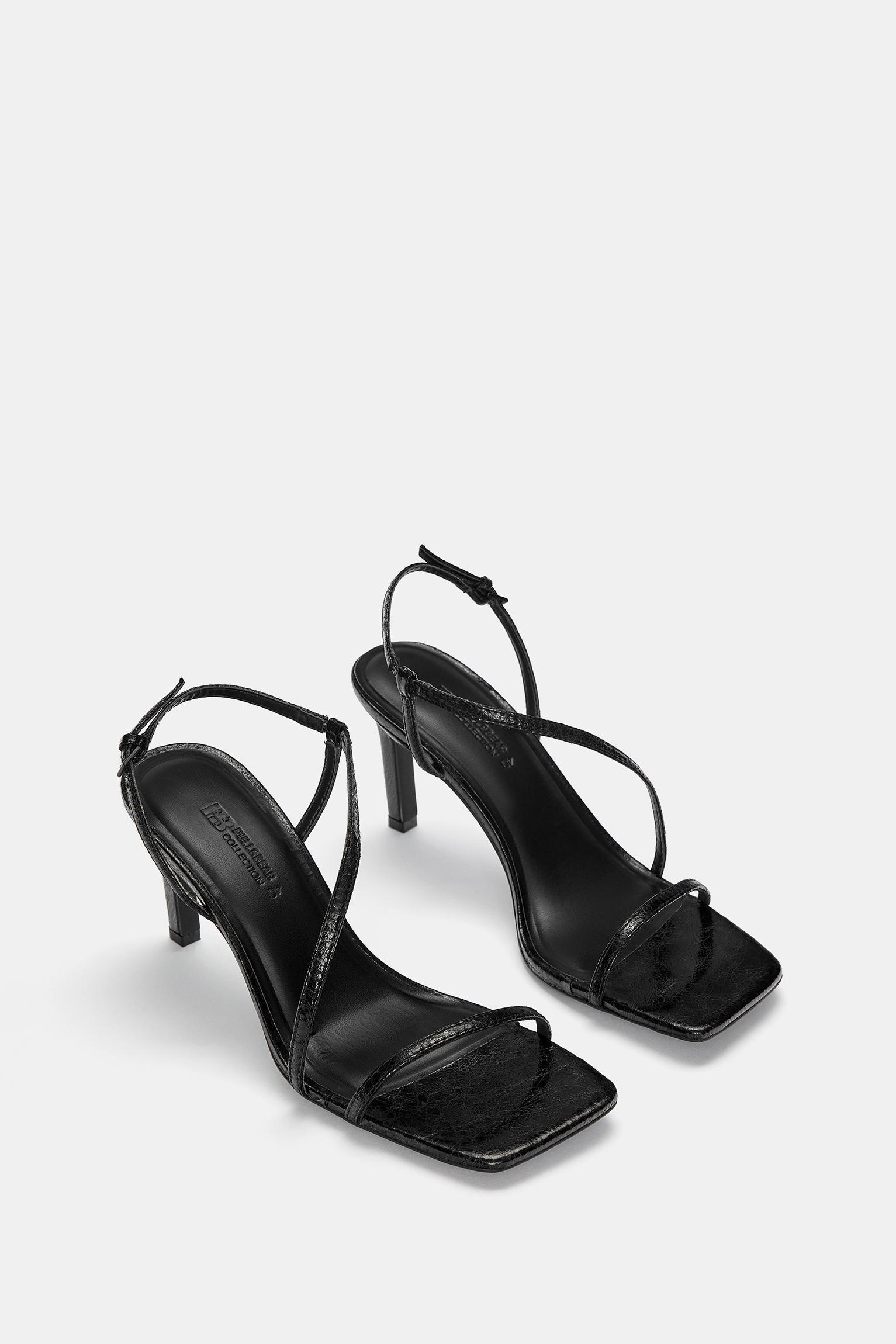 Heeled sandals with crossover straps Product Image