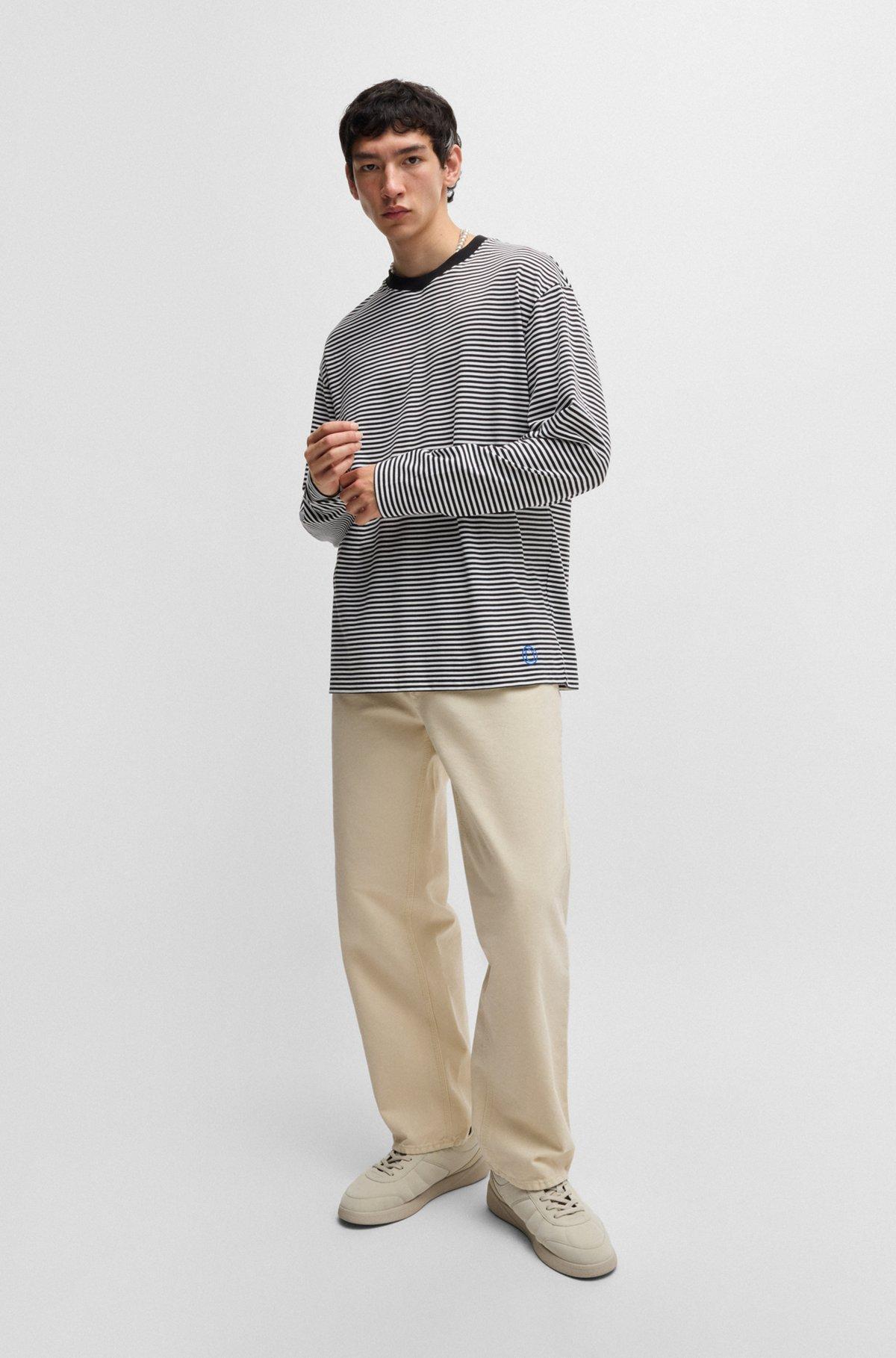 Baggy-fit trousers in cotton canvas Product Image