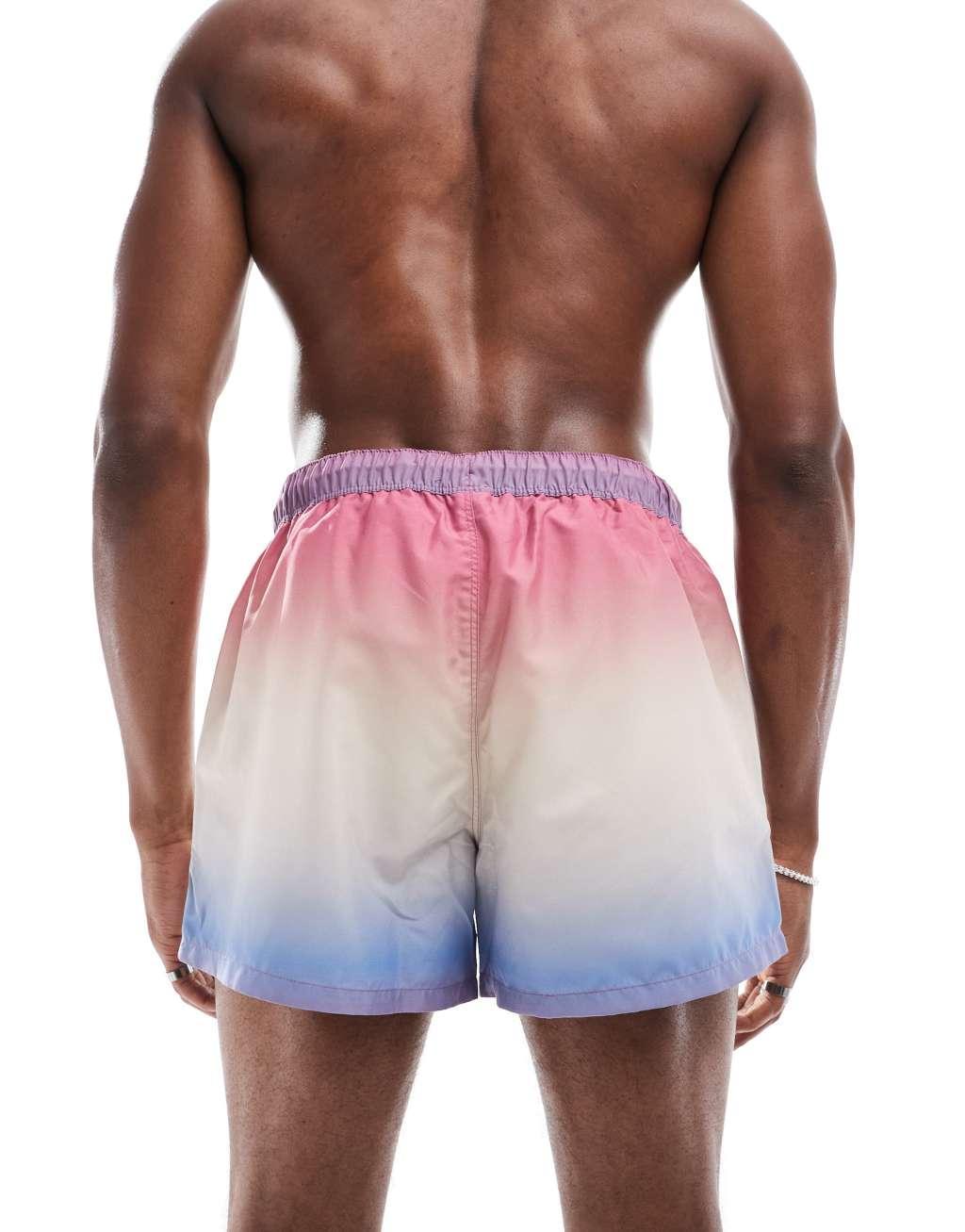 ASOS DESIGN swim shorts in short length in sunset print Product Image