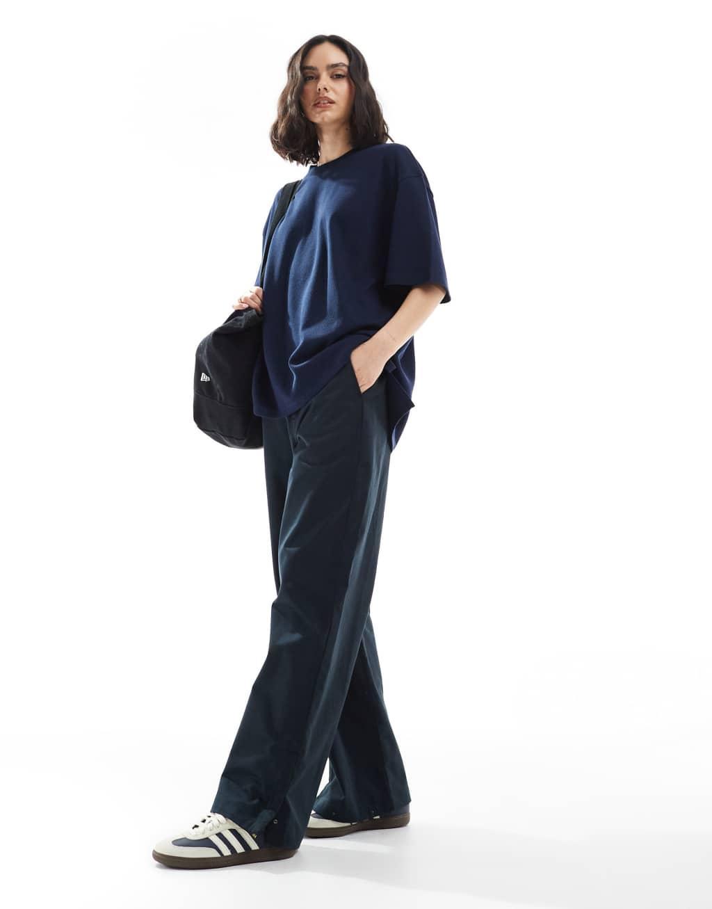 ASOS DESIGN oversized heavy weight waffle knit t-shirt with side slits in navy Product Image