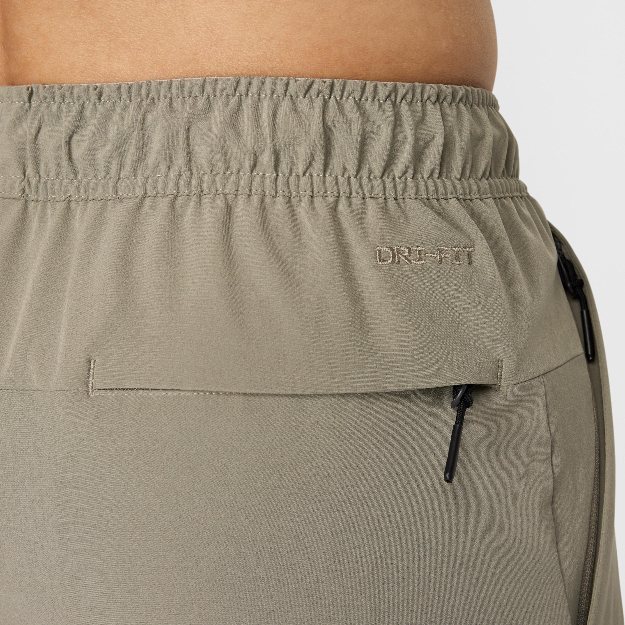 Nike Mens Unlimited Dri-FIT Zippered Cuff Versatile Pants | FB7548-320 Product Image