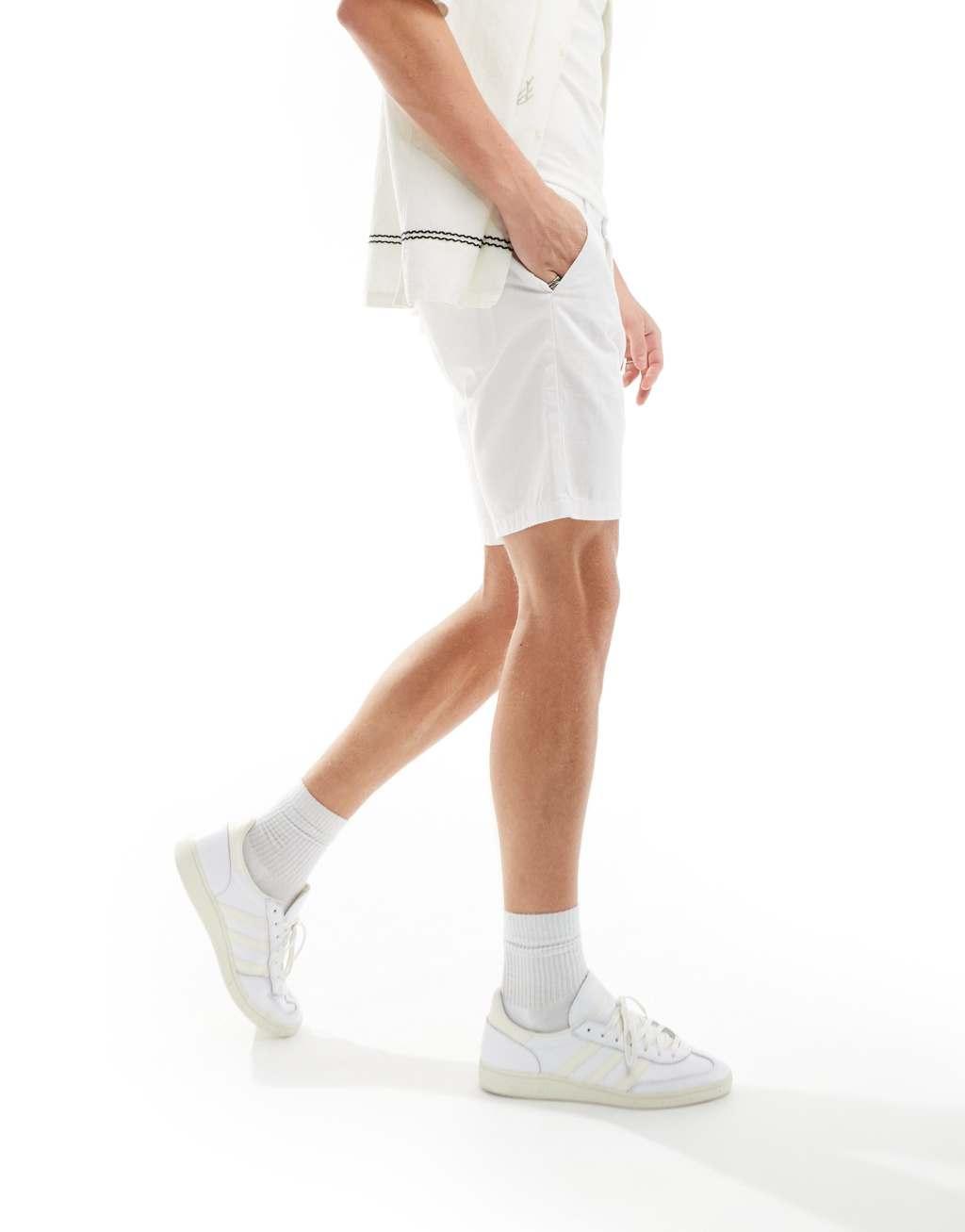 ASOS DESIGN slim stretch chino shorts in white Product Image