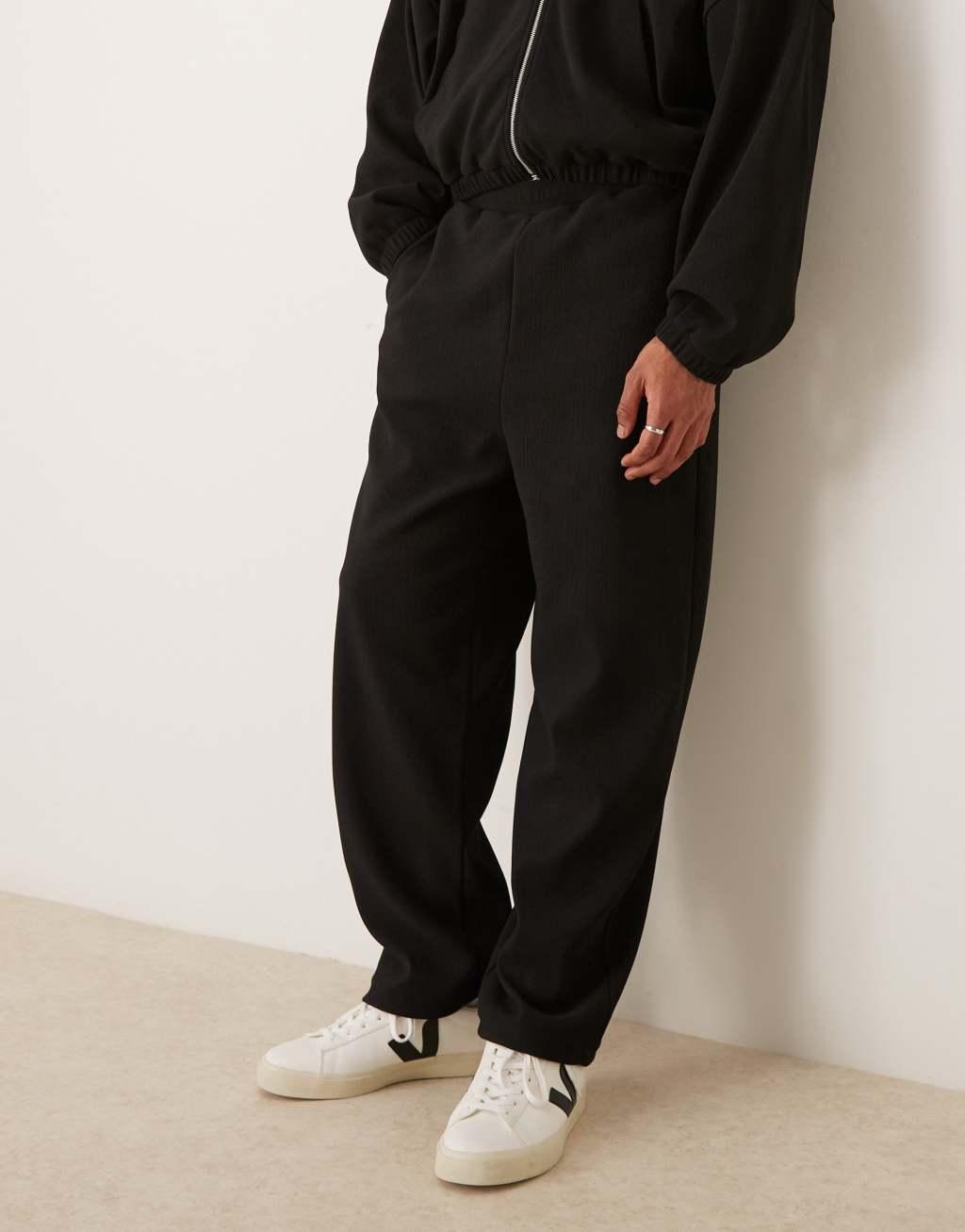 ASOS DESIGN super baggy ribbed sweatpants in black - part of a set Product Image