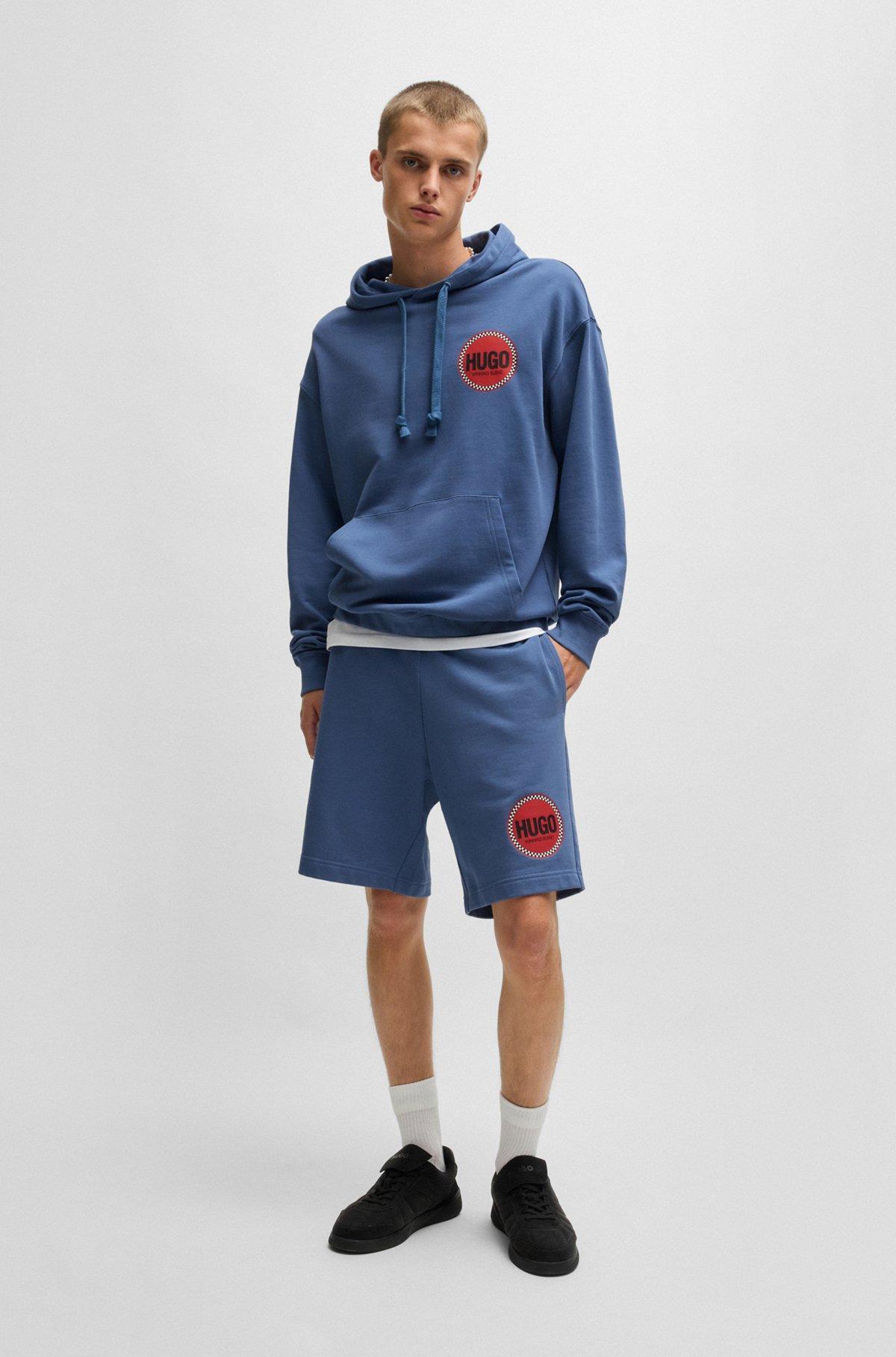 Cotton-terry relaxed-fit hoodie with logo prints Product Image